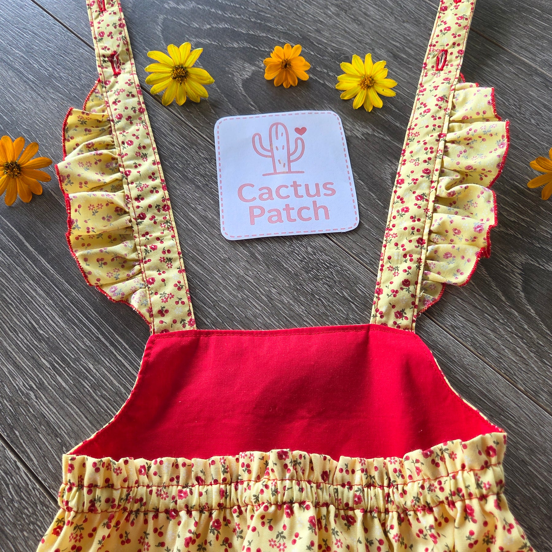 "Sunshine & Petals" Crossover Back Romper - Size 12 Months