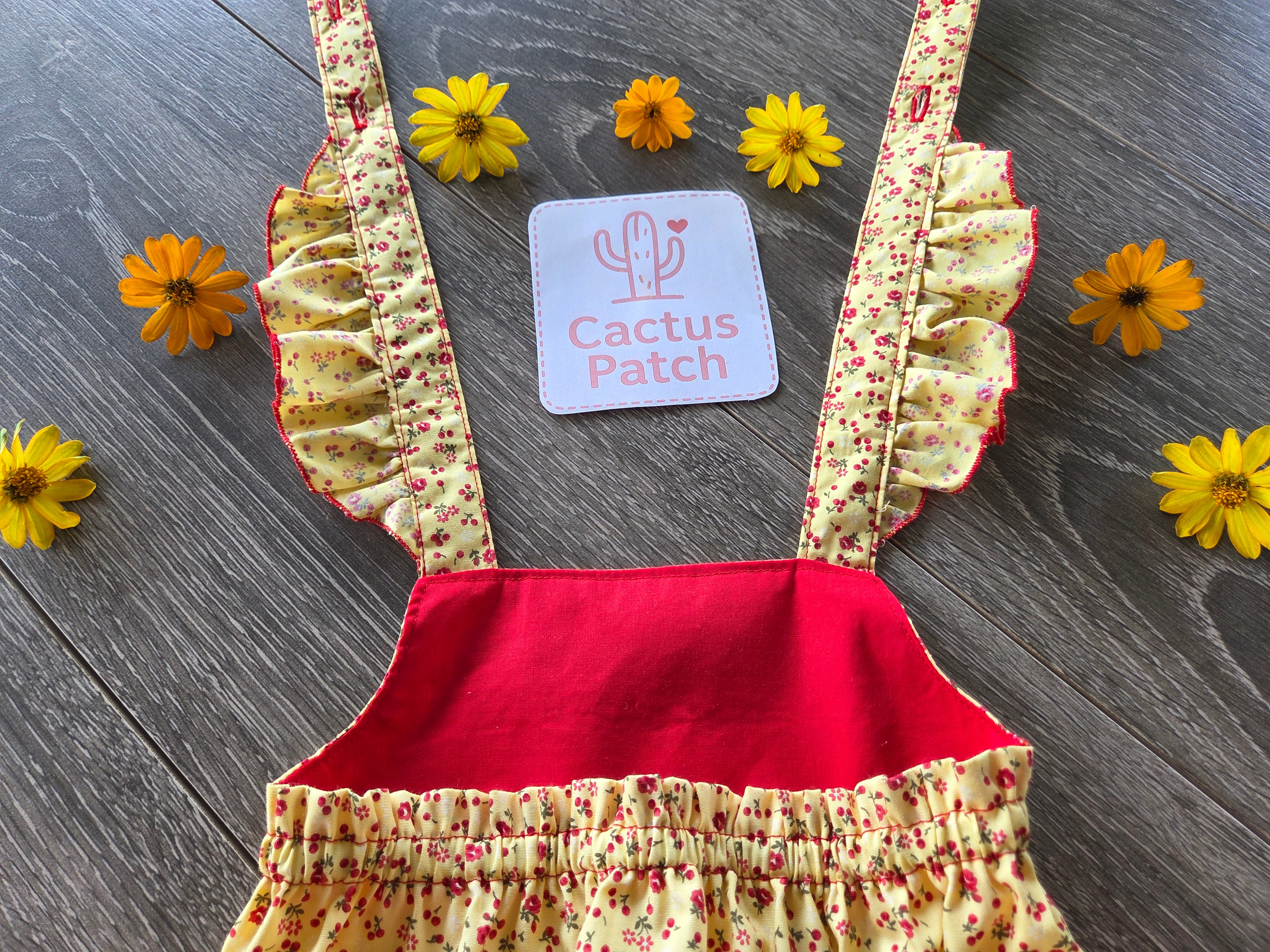 "Sunshine & Petals" Crossover Back Romper - Size 12 Months