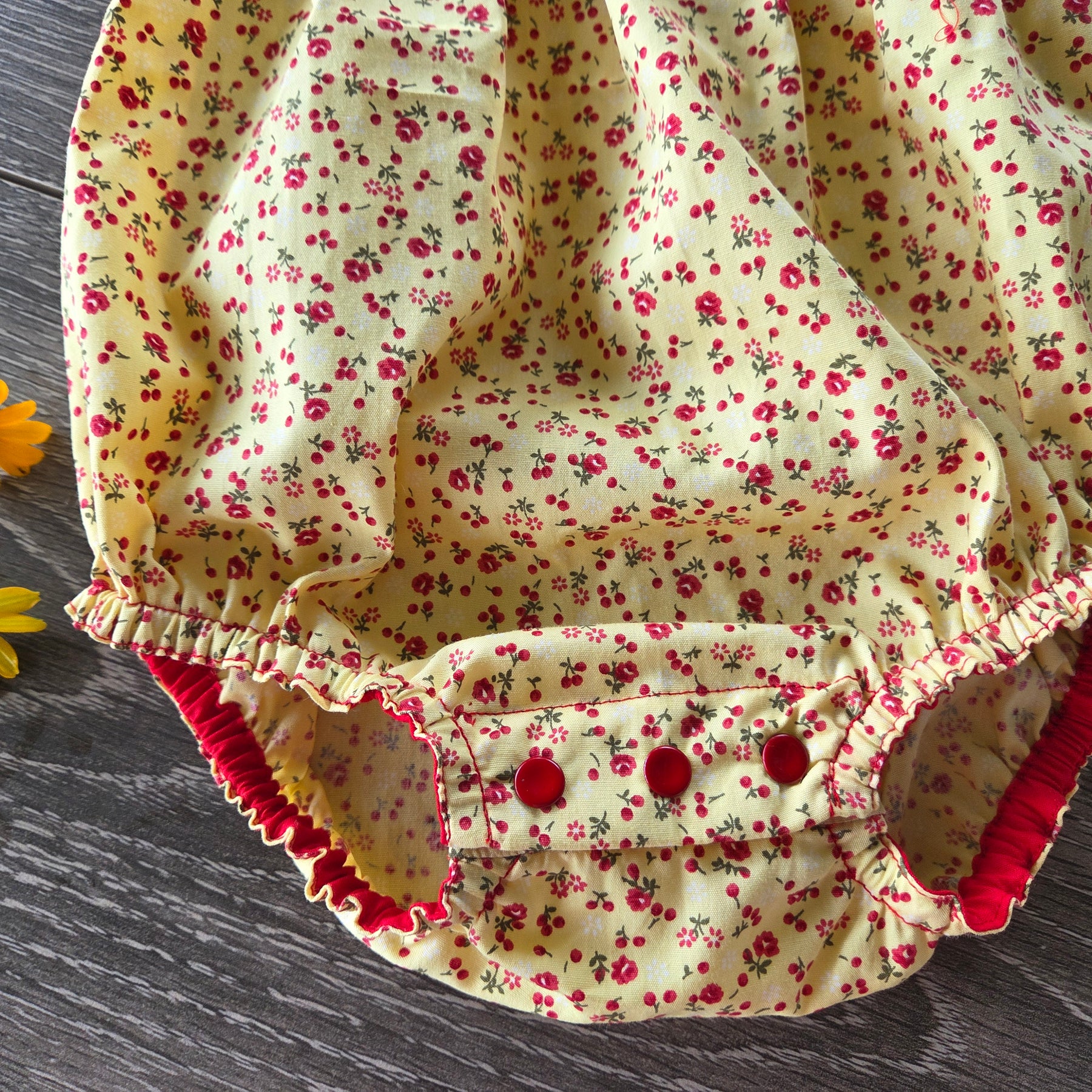 "Sunshine & Petals" Crossover Back Romper - Size 12 Months