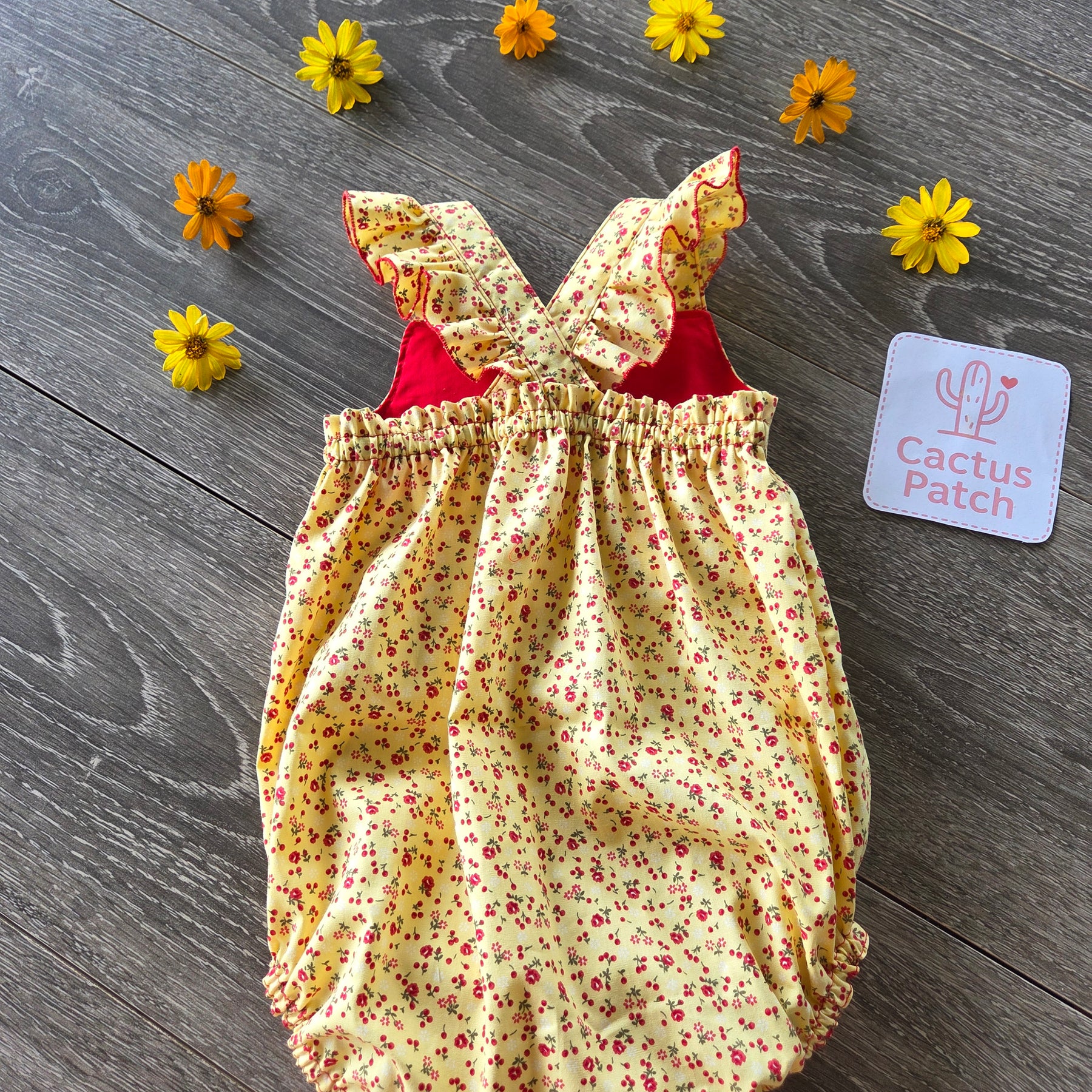 "Sunshine & Petals" Crossover Back Romper - Size 12 Months