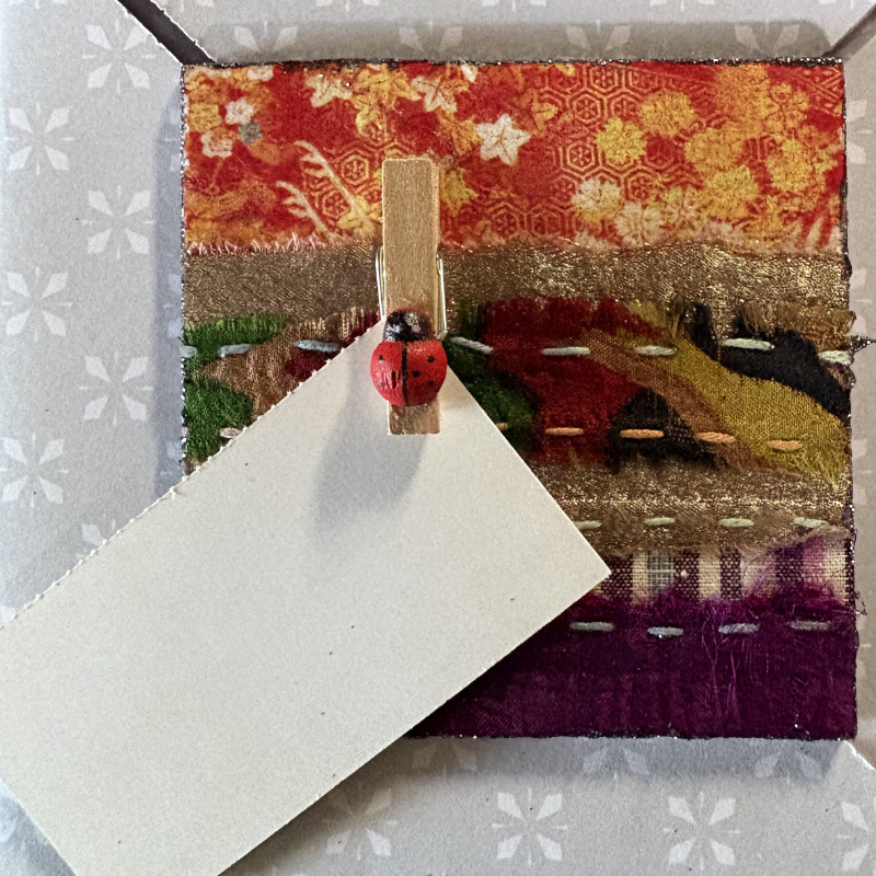 Fridge art magnet in orange and purple