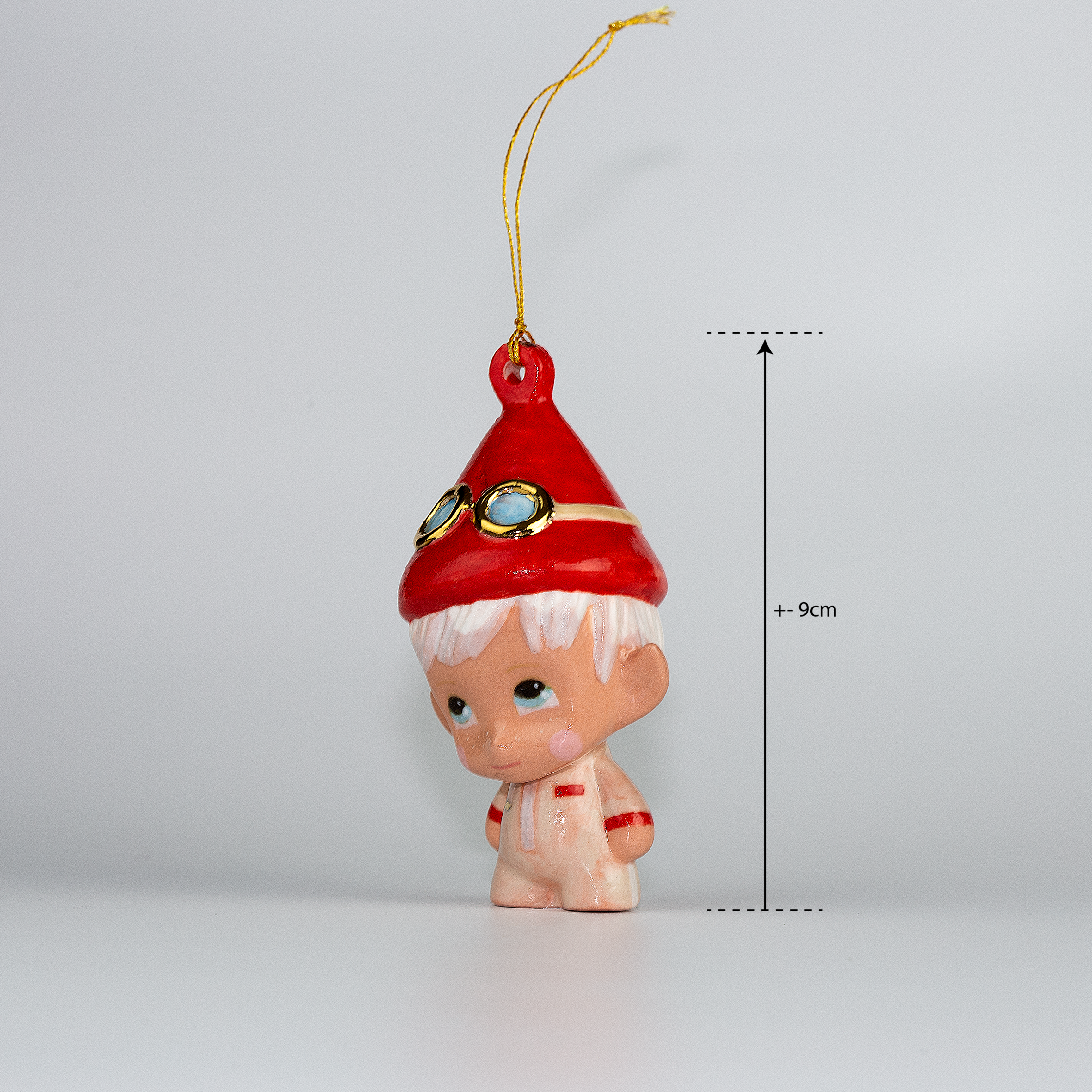 Handmade Porcelain Christmas ornament. One-of-a-kind. Zac, the sleigh mechanic Elf.
