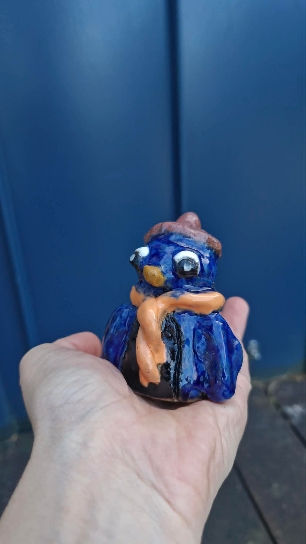 Small Penguin Wearing Beanie Sculpture.