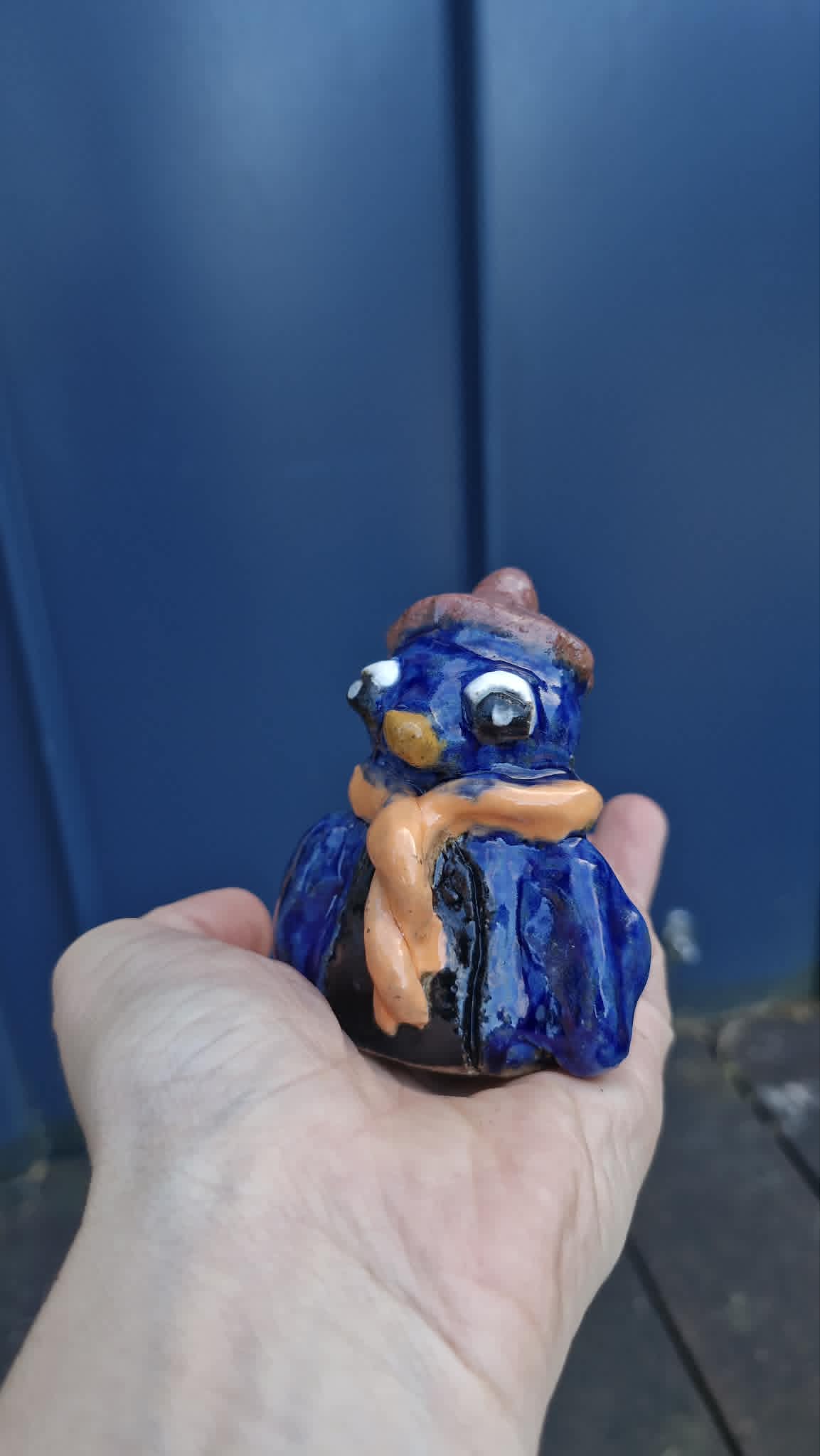 Small Penguin Wearing Beanie Sculpture.