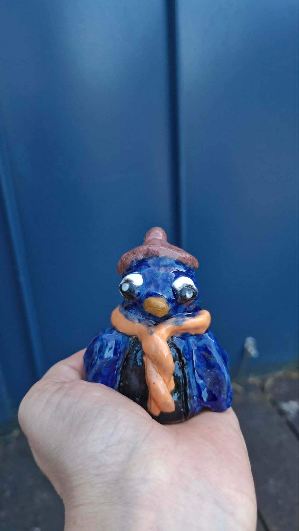 Small Penguin Wearing Beanie Sculpture.