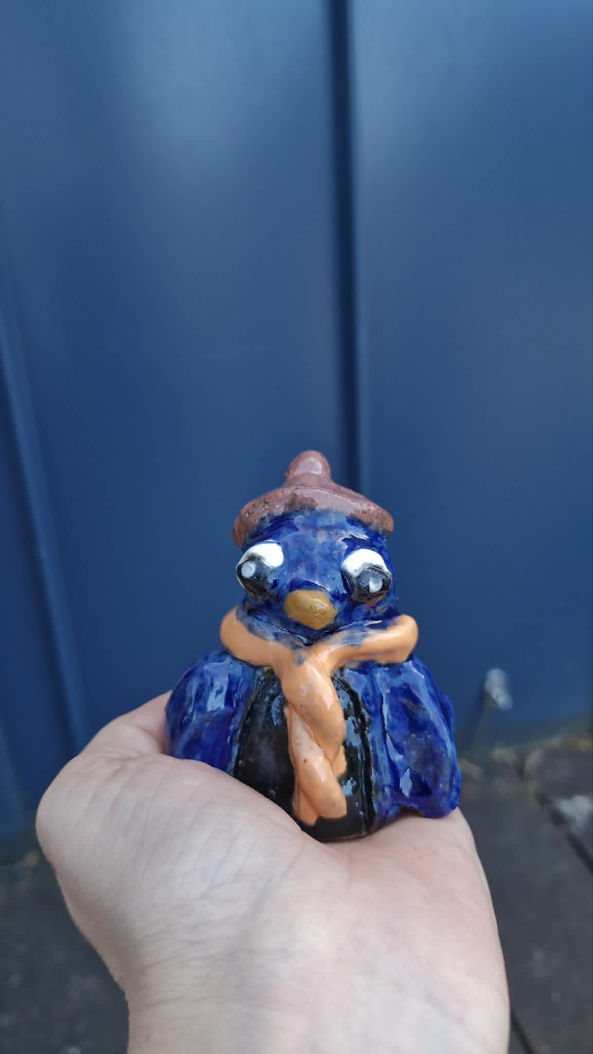 Small Penguin Wearing Beanie Sculpture.