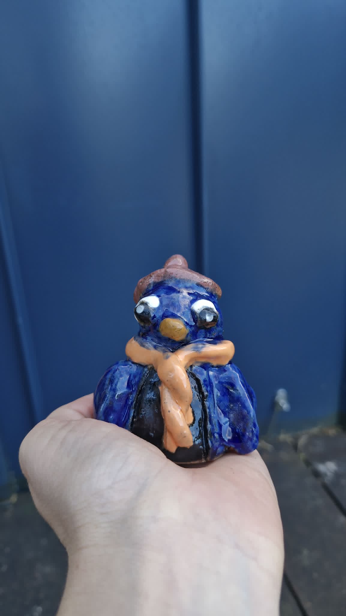Small Penguin Wearing Beanie Sculpture.
