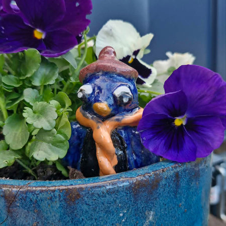 Small Penguin Wearing Beanie Sculpture.