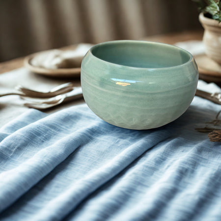 8 x 6.5cm  moon bowl in wheel thrown stoneware clay. Fully glazed