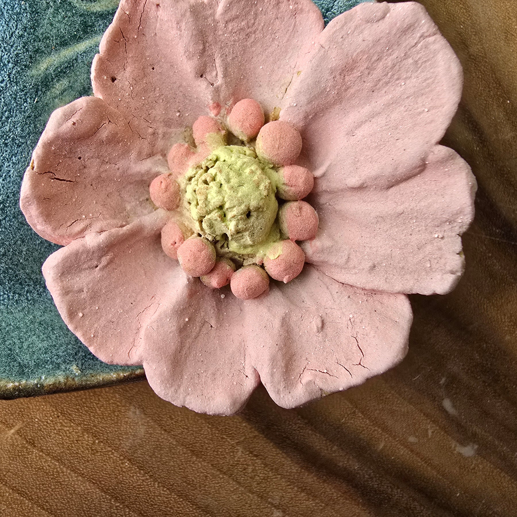 Turquoise floral trinket dish.