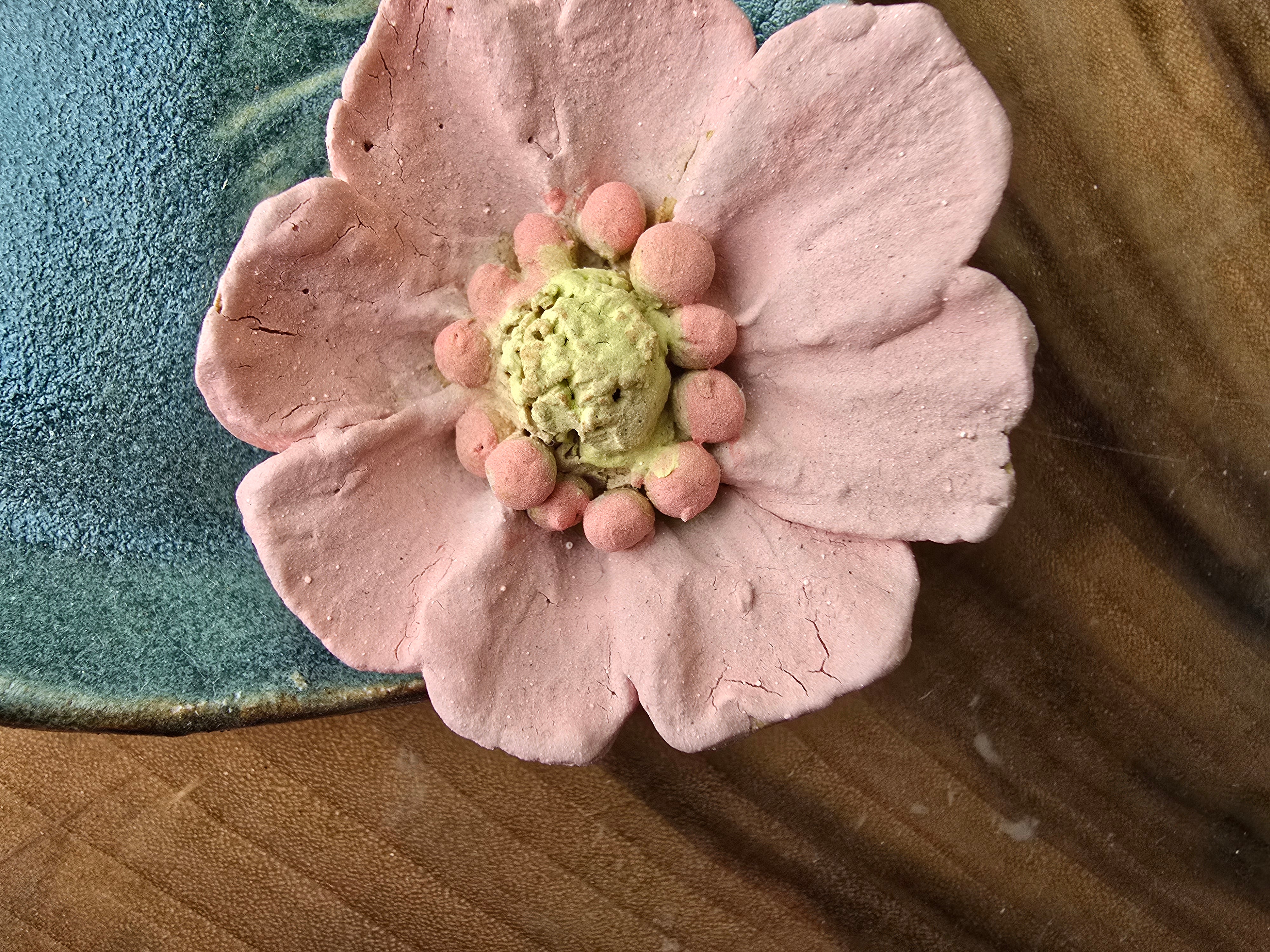 Turquoise floral trinket dish.