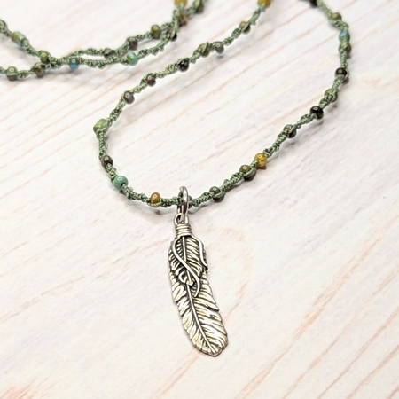 Macrame necklace with feather pendant | limited edition glass beads