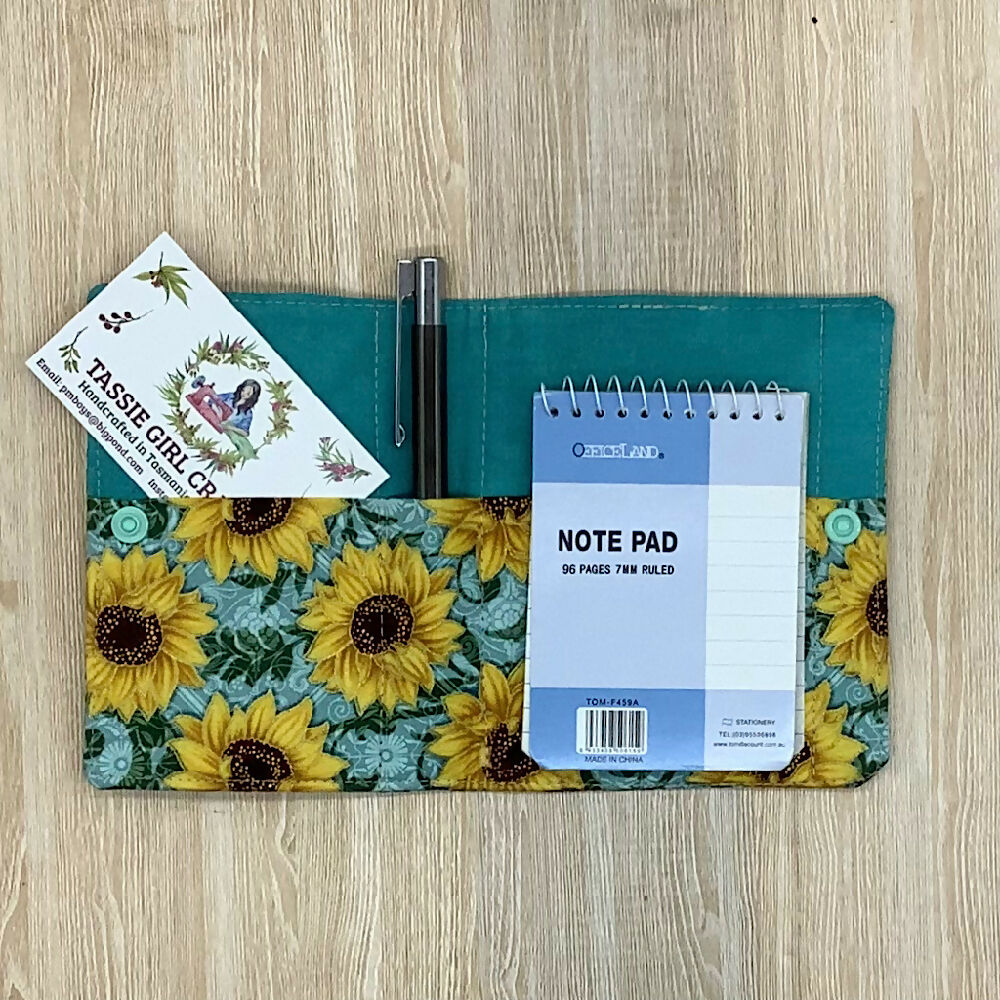 Sunflowers refillable fabric pocket notepad cover with snap closure. Incl. book and pen.