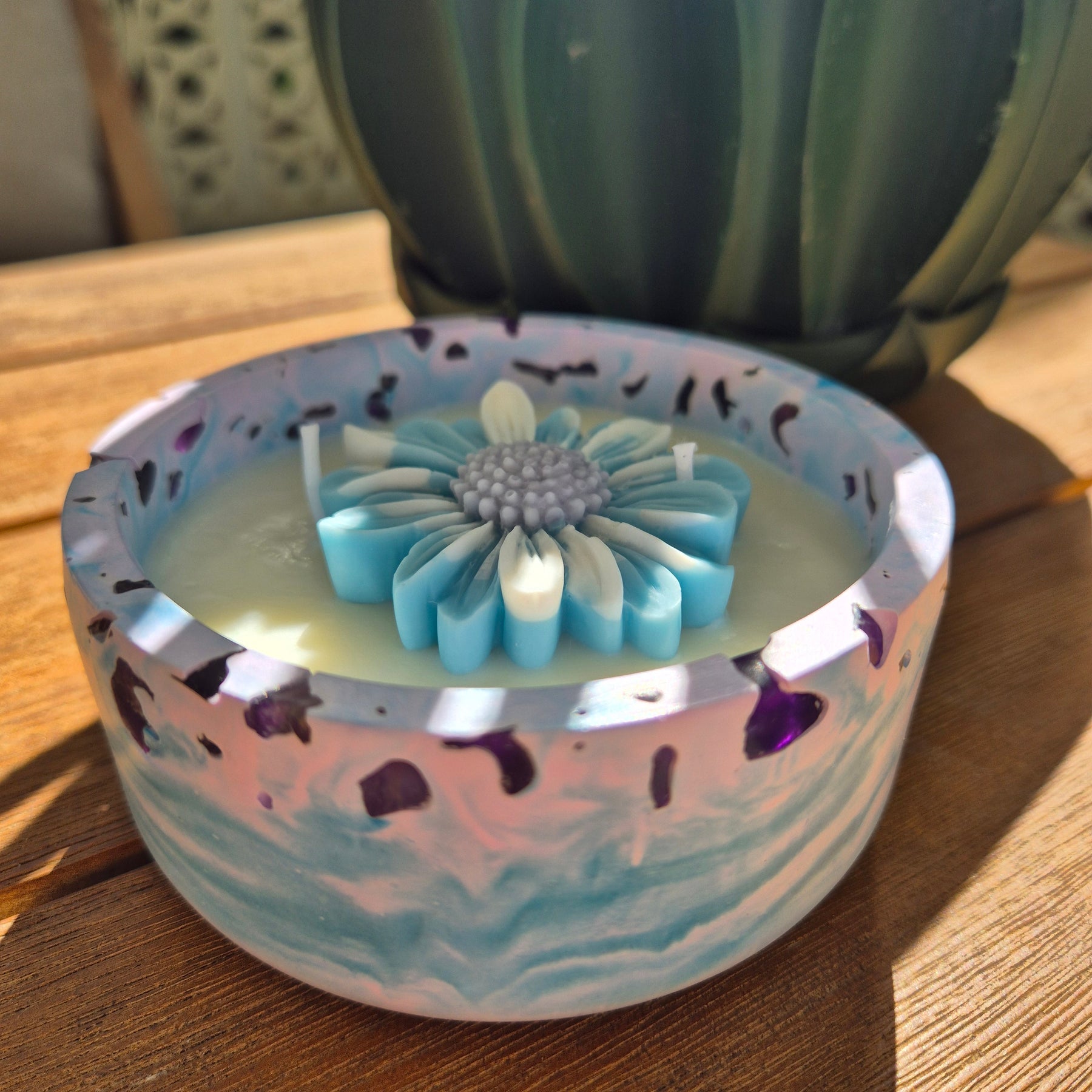 Round blue and purple concrete bowl candle with amethyst stones