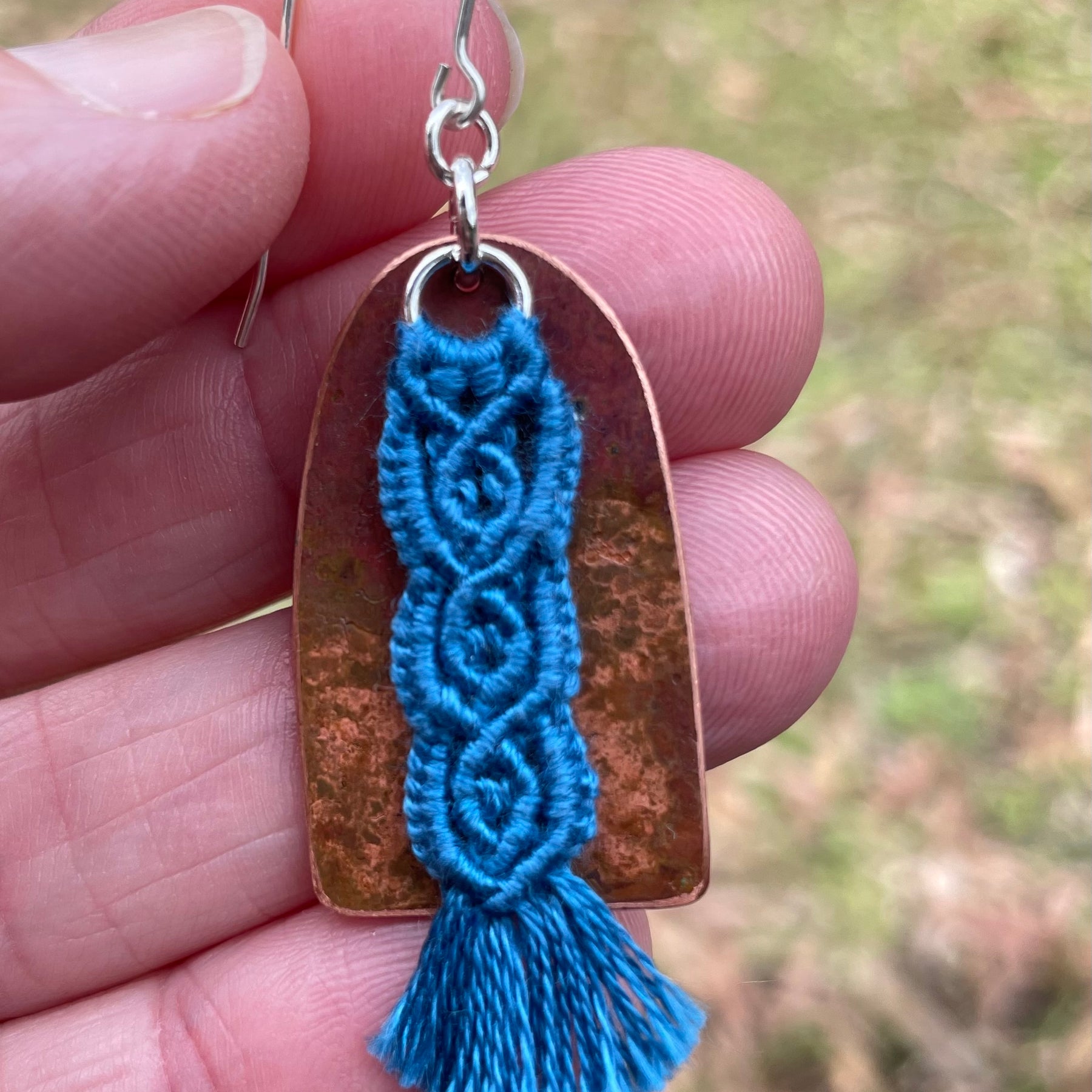 Blue macrame thread on patinated copper