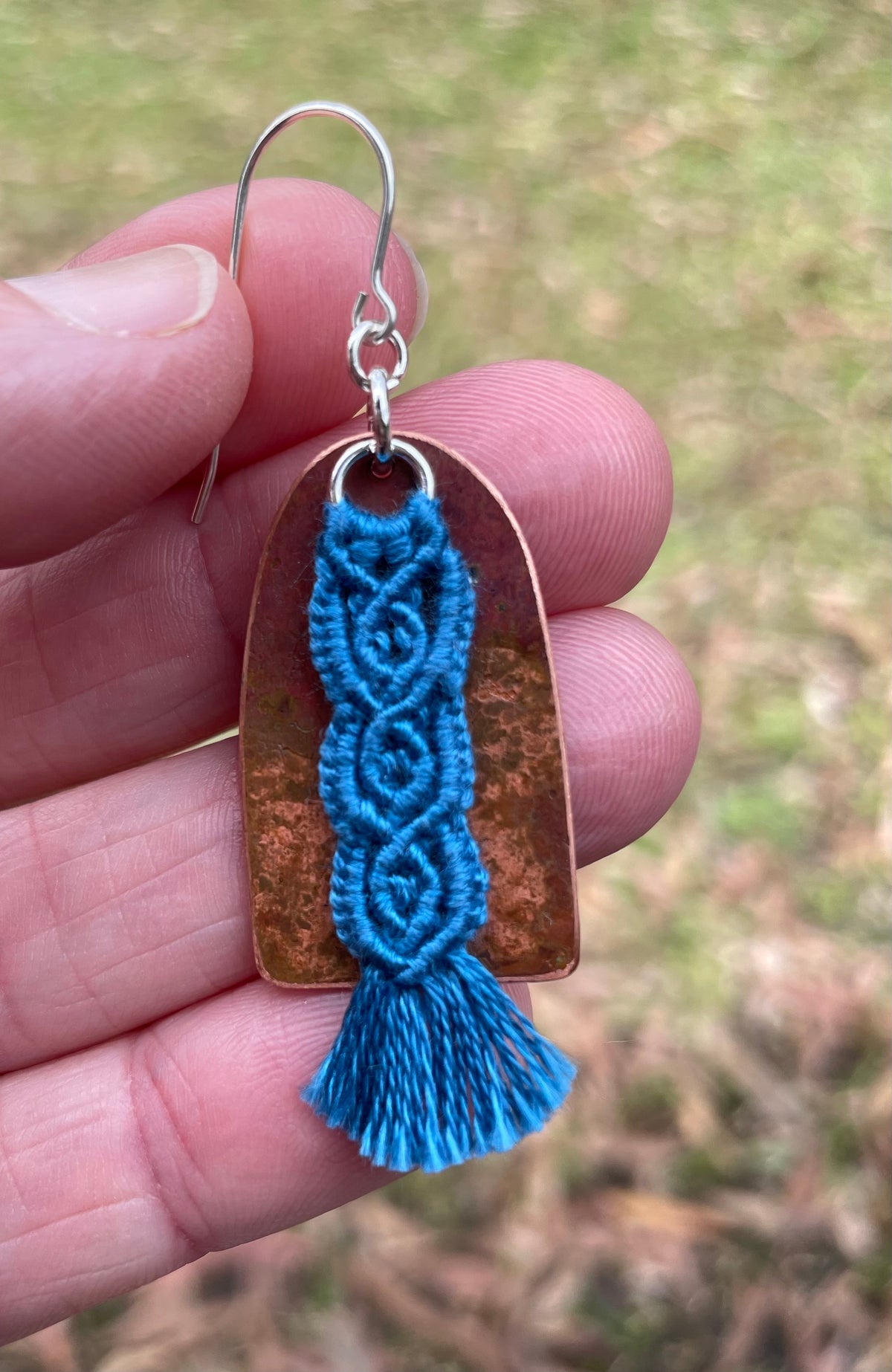 Blue macrame thread on patinated copper