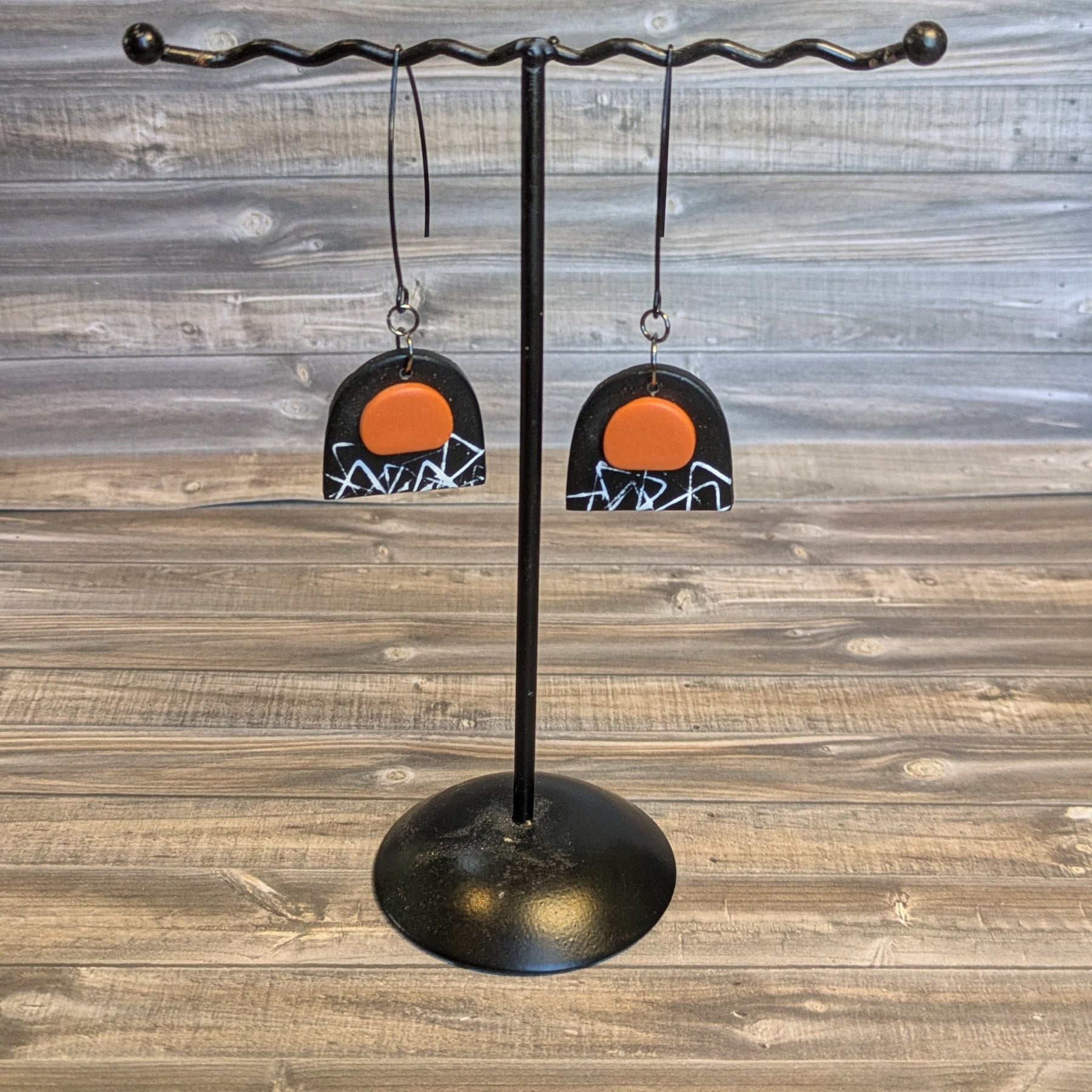 Black & orange arch earrings