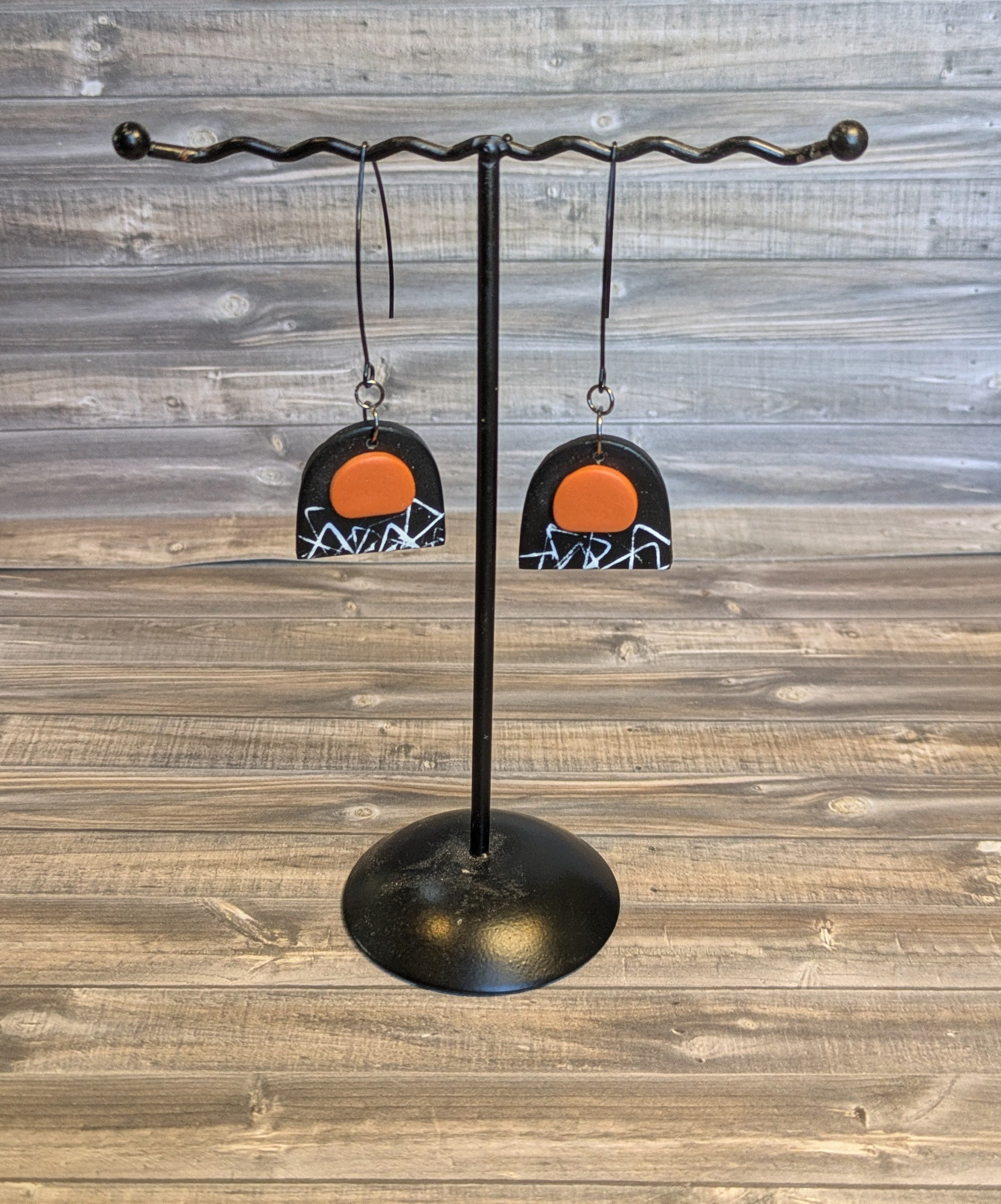 Black & orange arch earrings