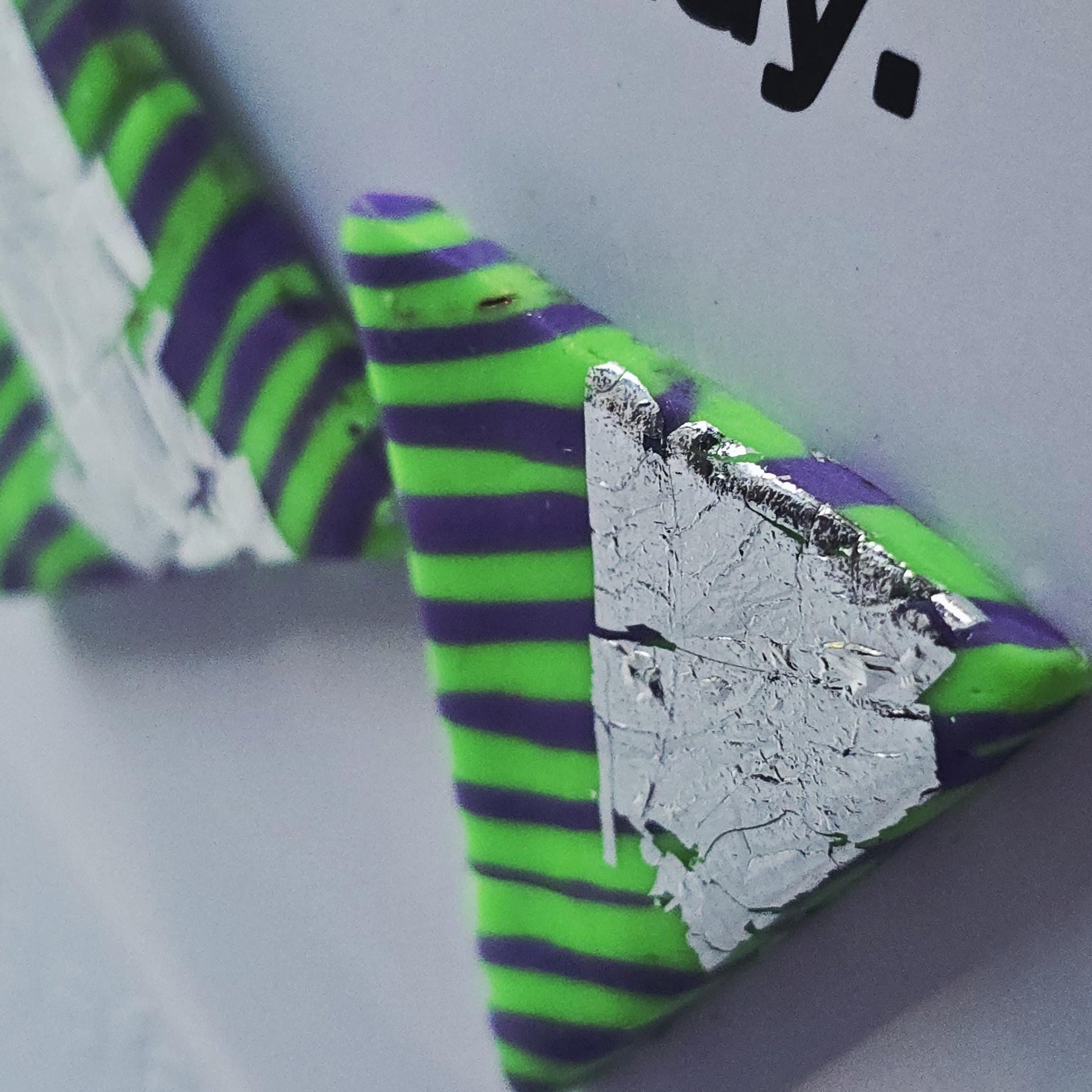 Neon Green Purple Triangle Studs