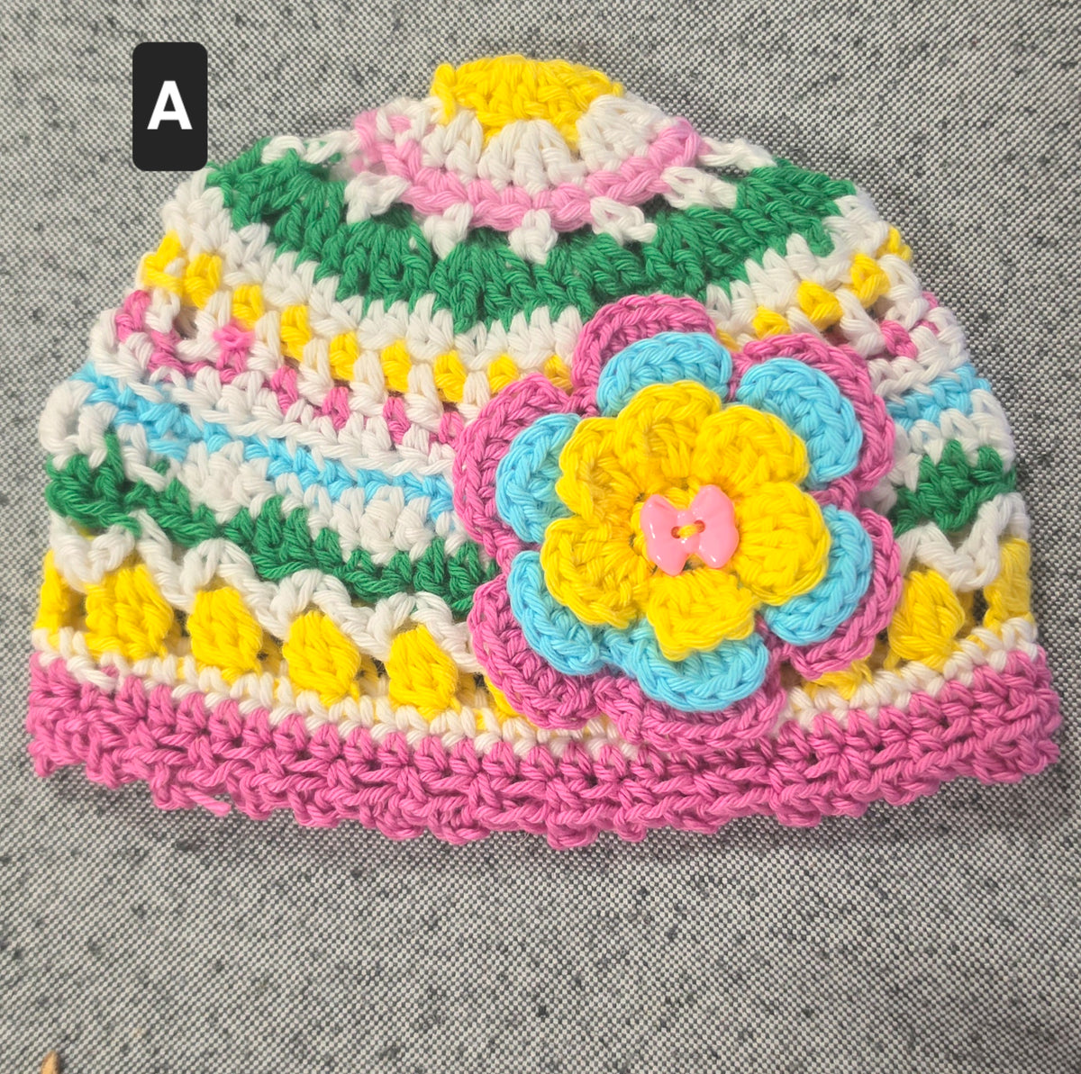 Crocheted Baby Hat with Flower Detail