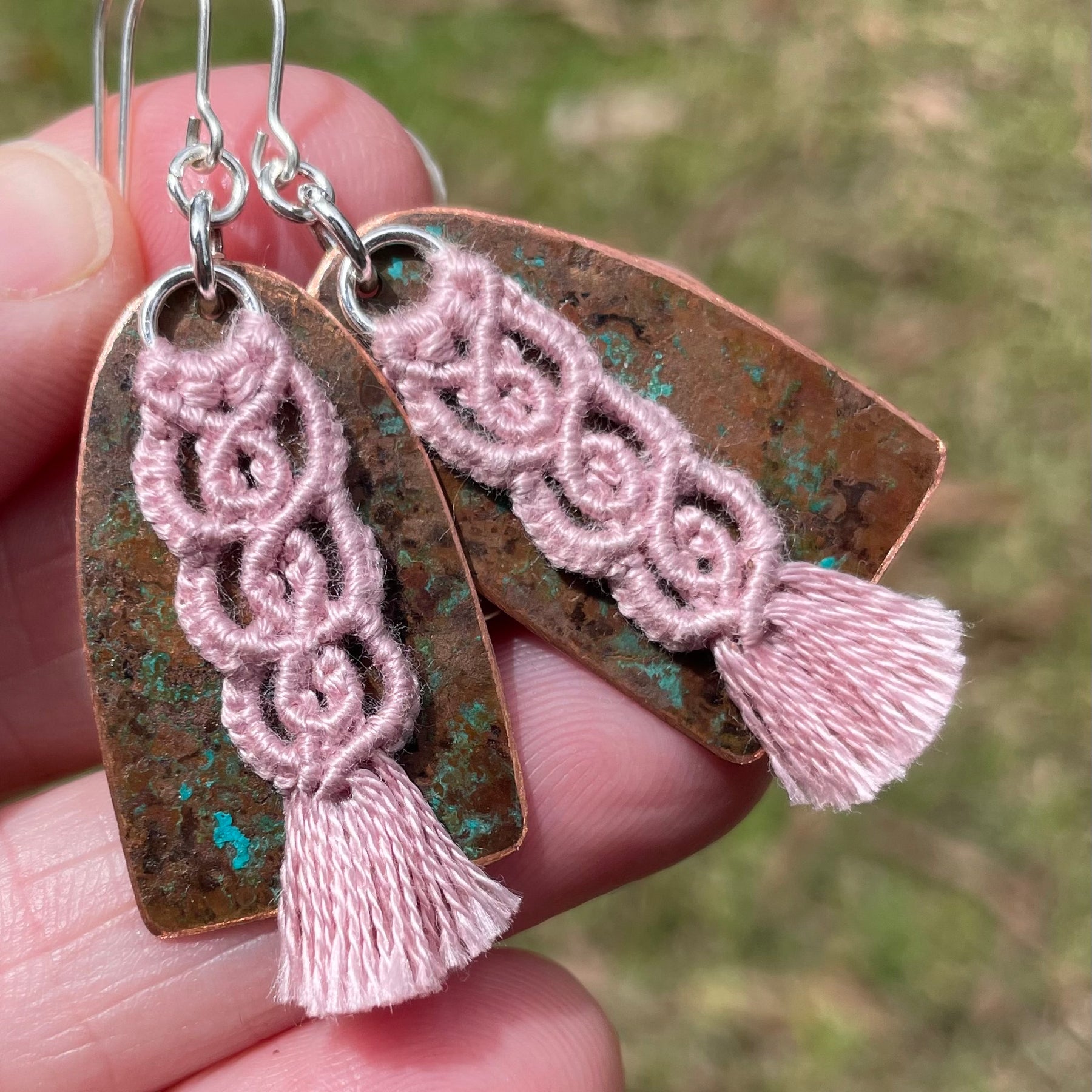 Pink macrame thread on patinated copper