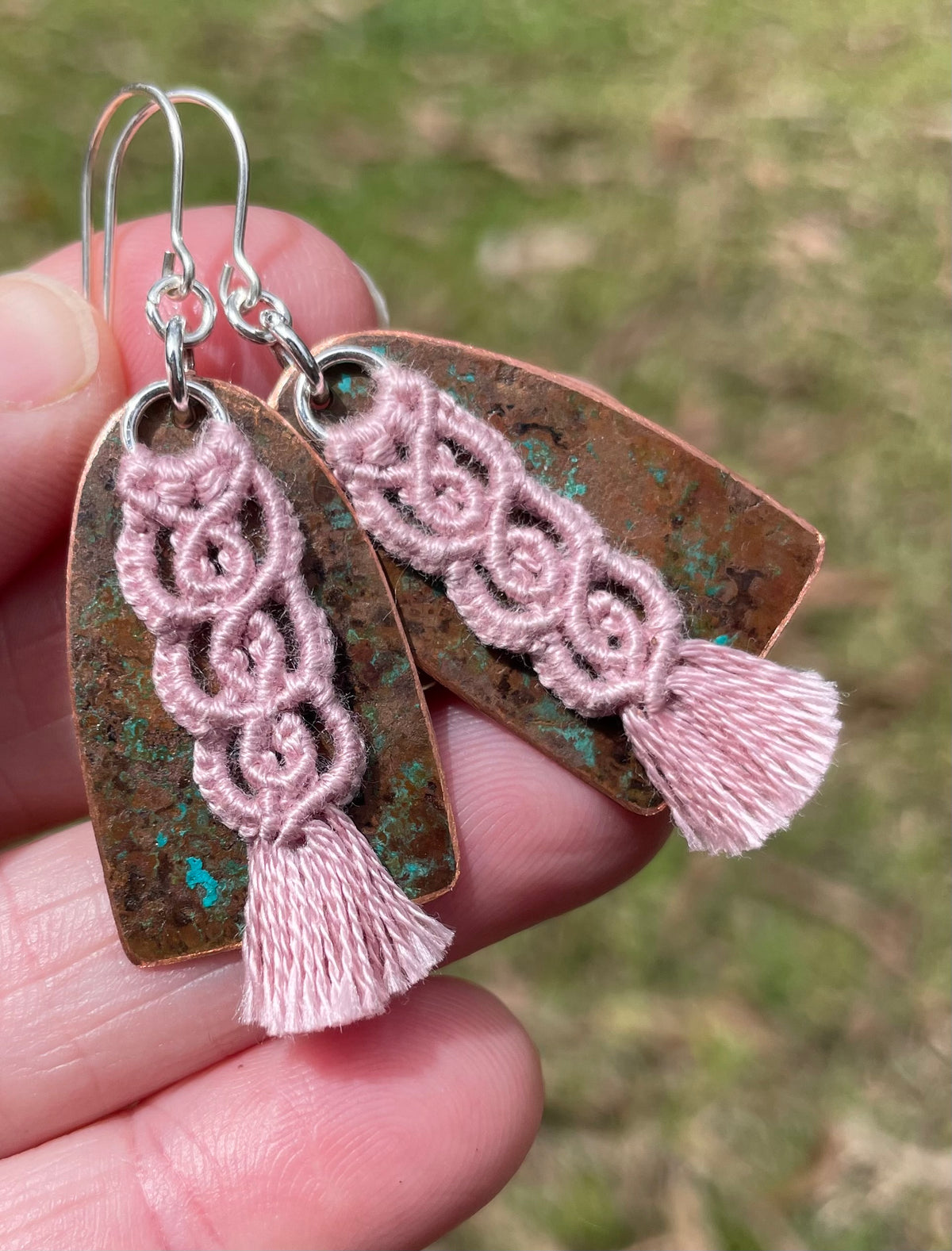 Pink macrame thread on patinated copper