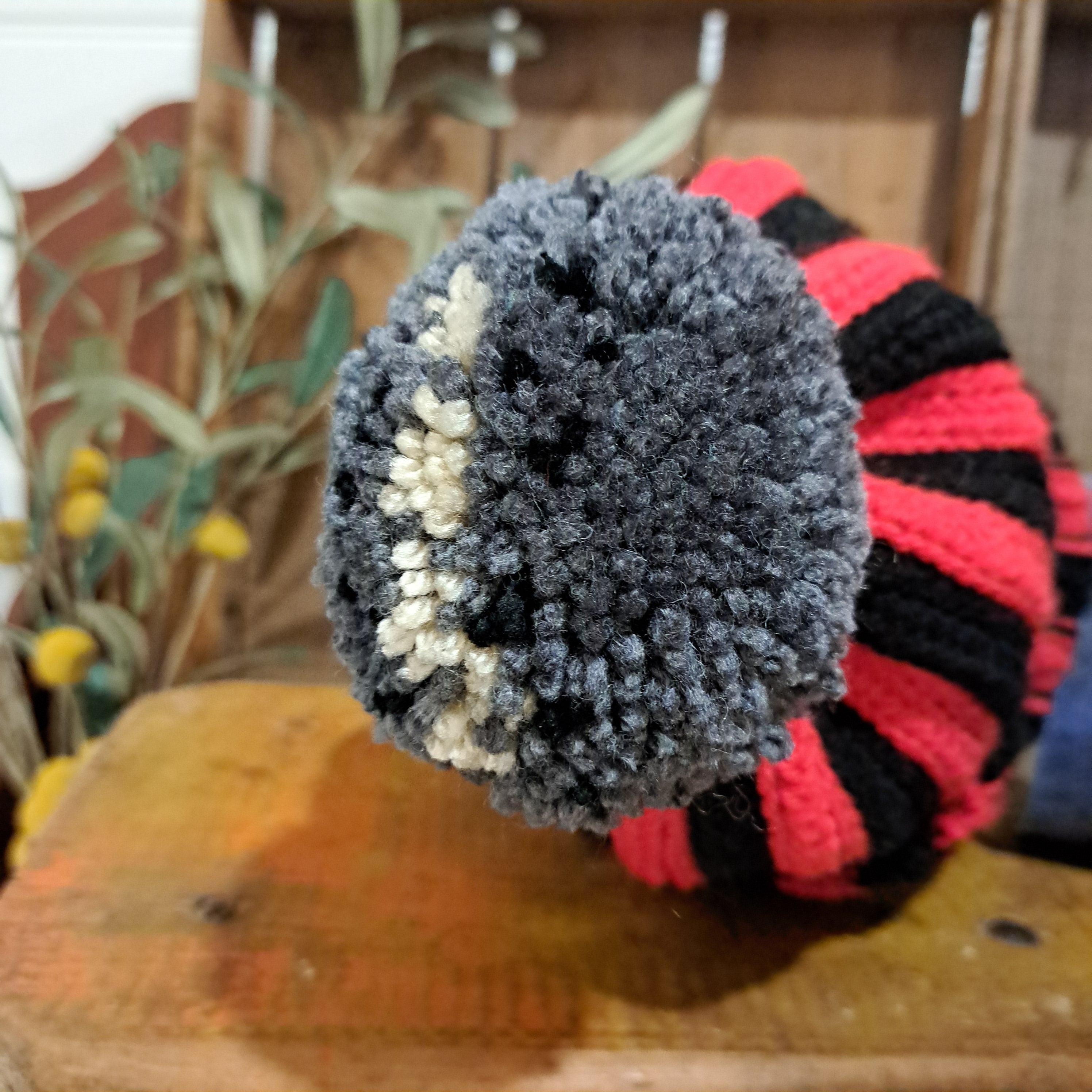 Crochet beanie/ red and black stripe/ football pompom