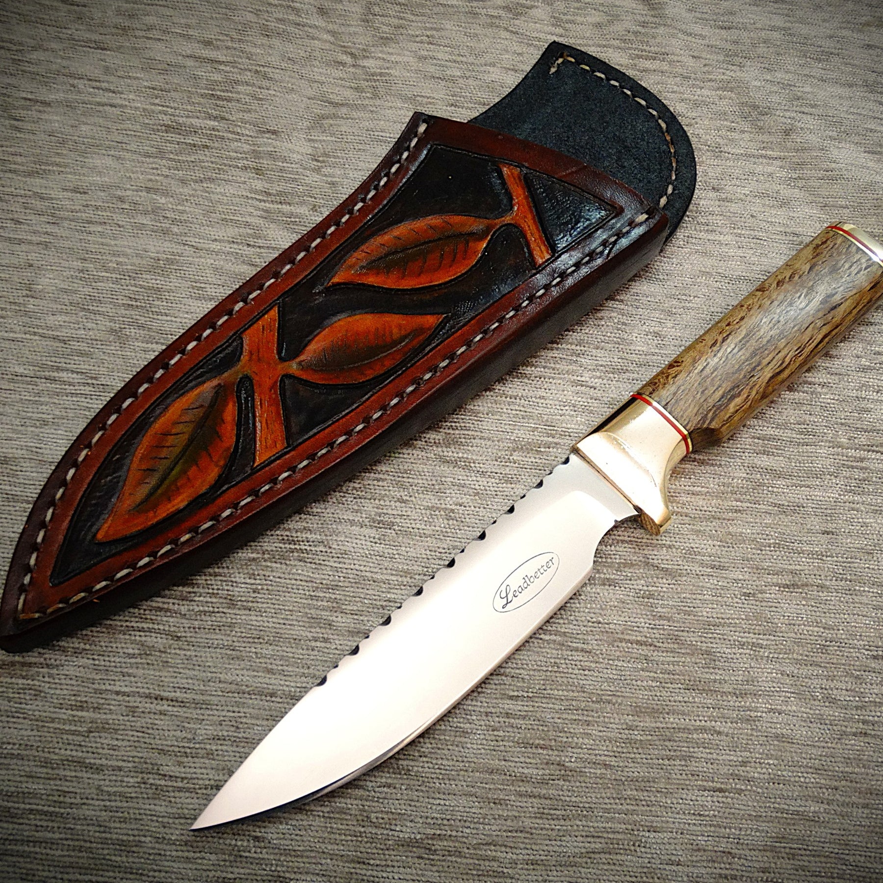 Utility hunting outdoors knife, leather sheath, timber handle