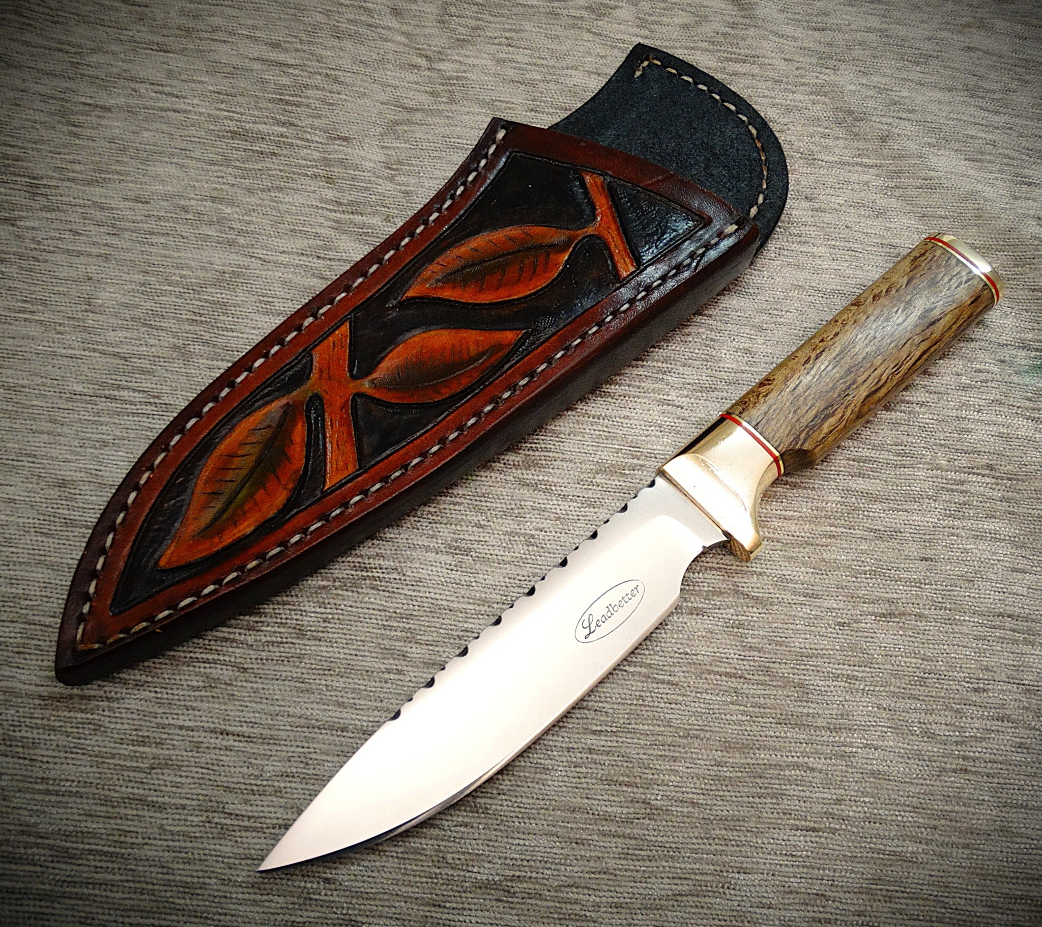 Utility hunting outdoors knife, leather sheath, timber handle