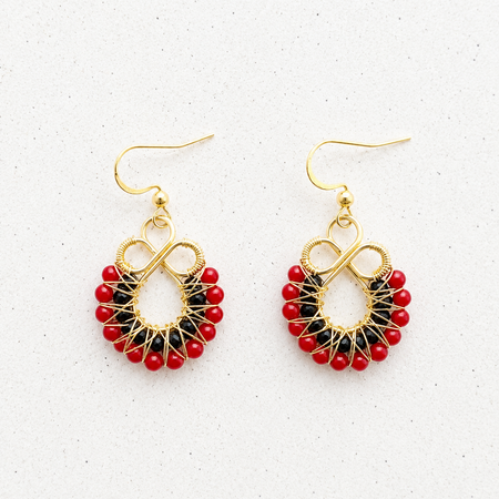 Gold onyx and red coral earrings