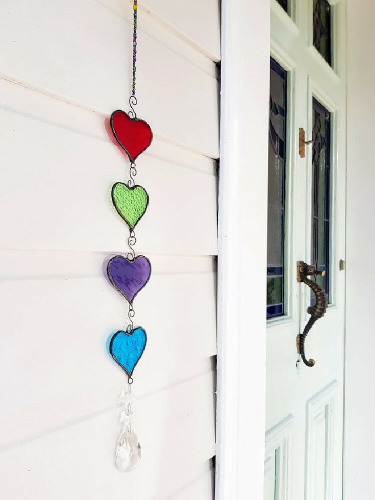 four colourful stained glass hanging hearts, hanging chain of hearts