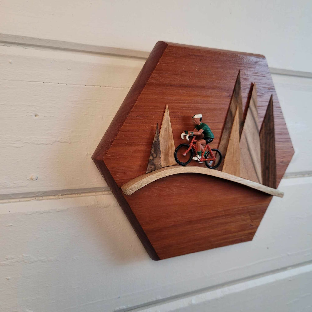 Wooden frame less 3d plaque of cyclist in the mountains