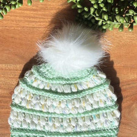 Children’s textured beanies with detachable pompom