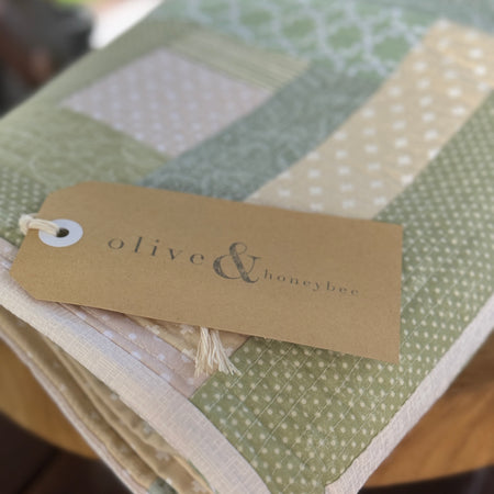 Green Fields decorative lap quilt