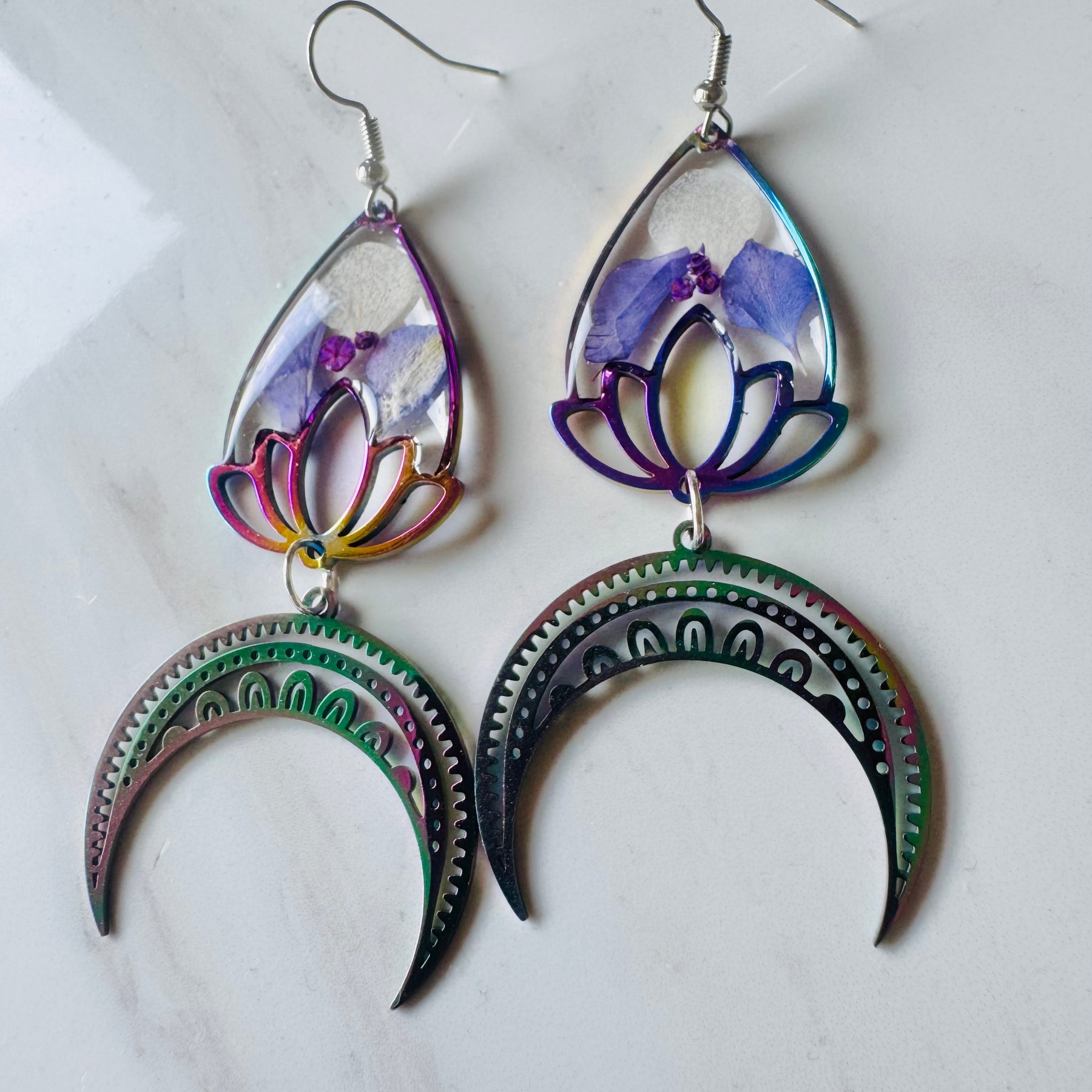 Iridescent rainbow resin earrings with pressed flowers
