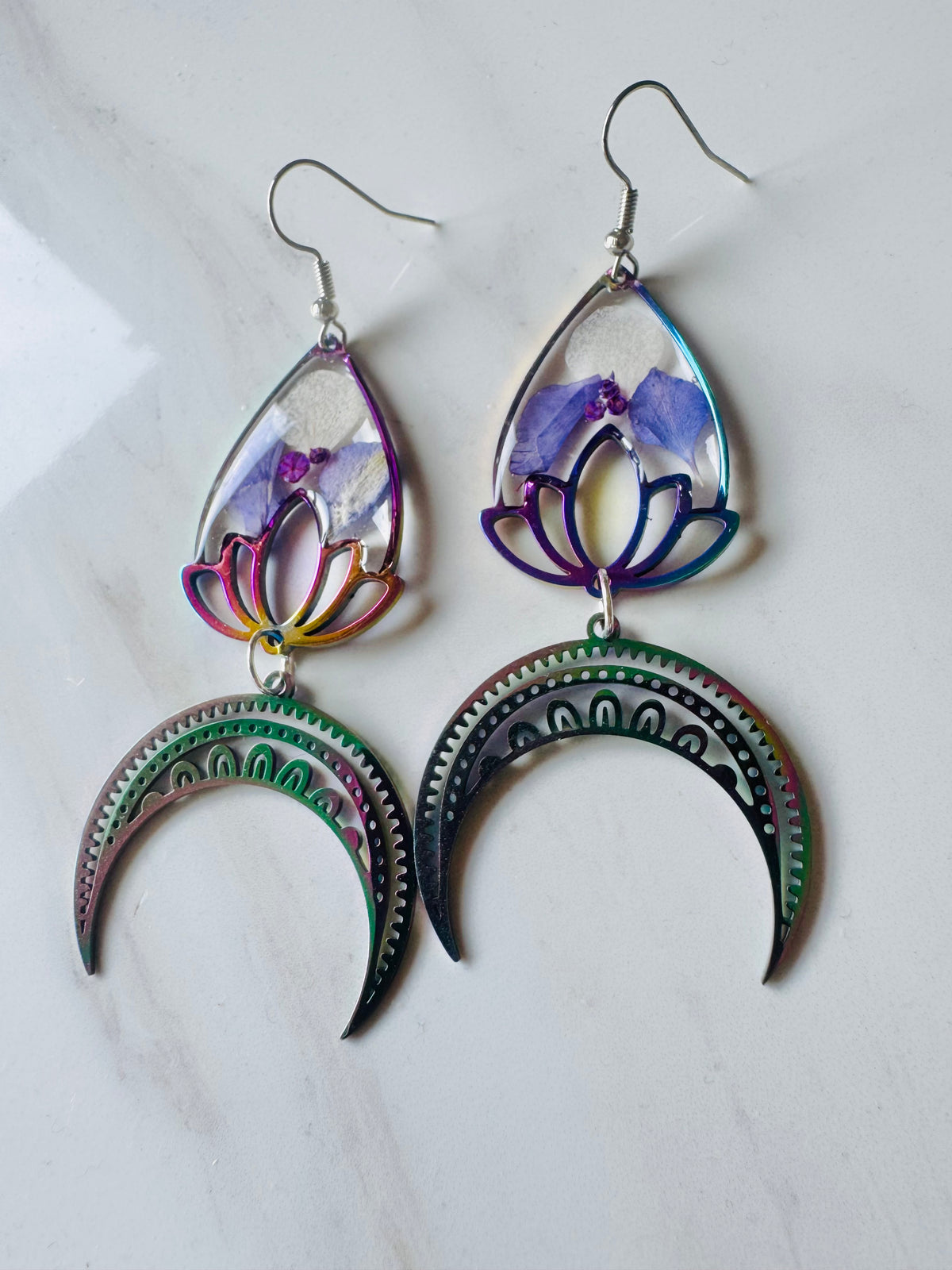 Iridescent rainbow resin earrings with pressed flowers