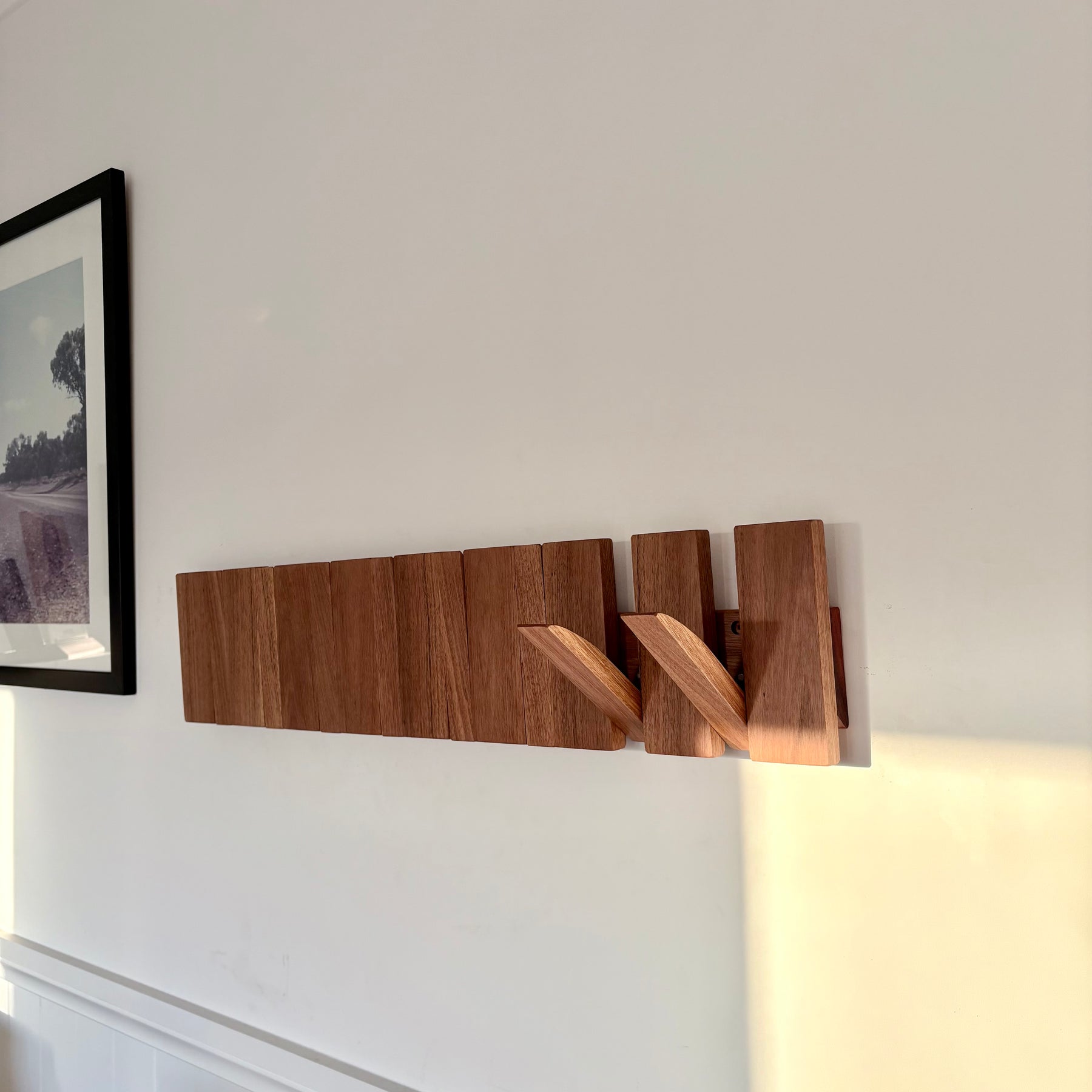 Grey box piano style coat rack