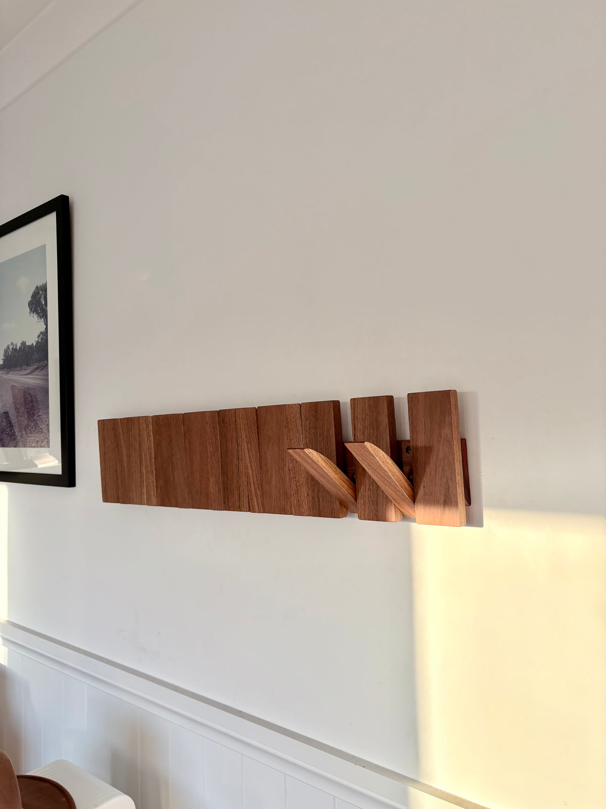 Grey box piano style coat rack