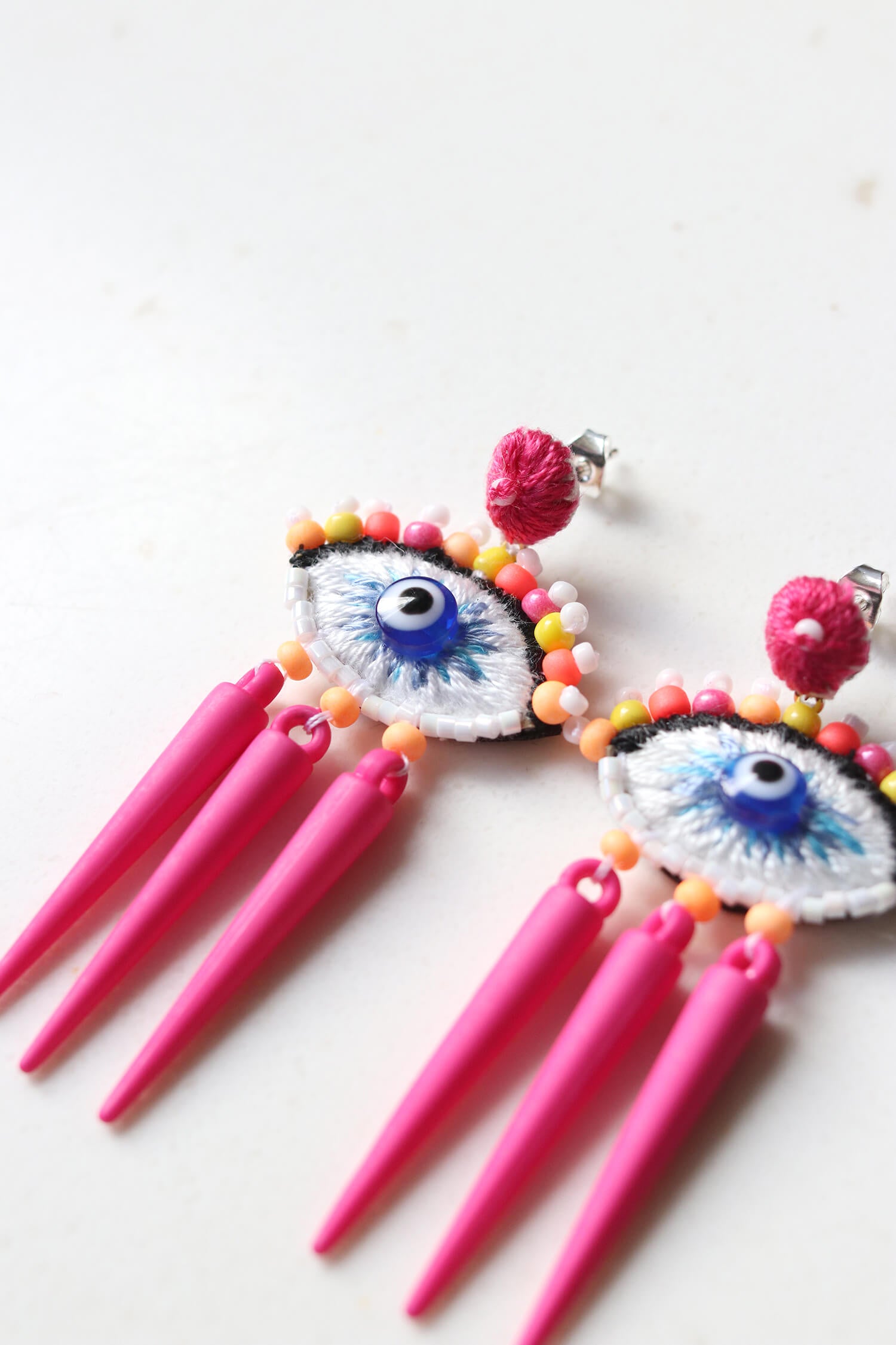Eye Motif Earrings