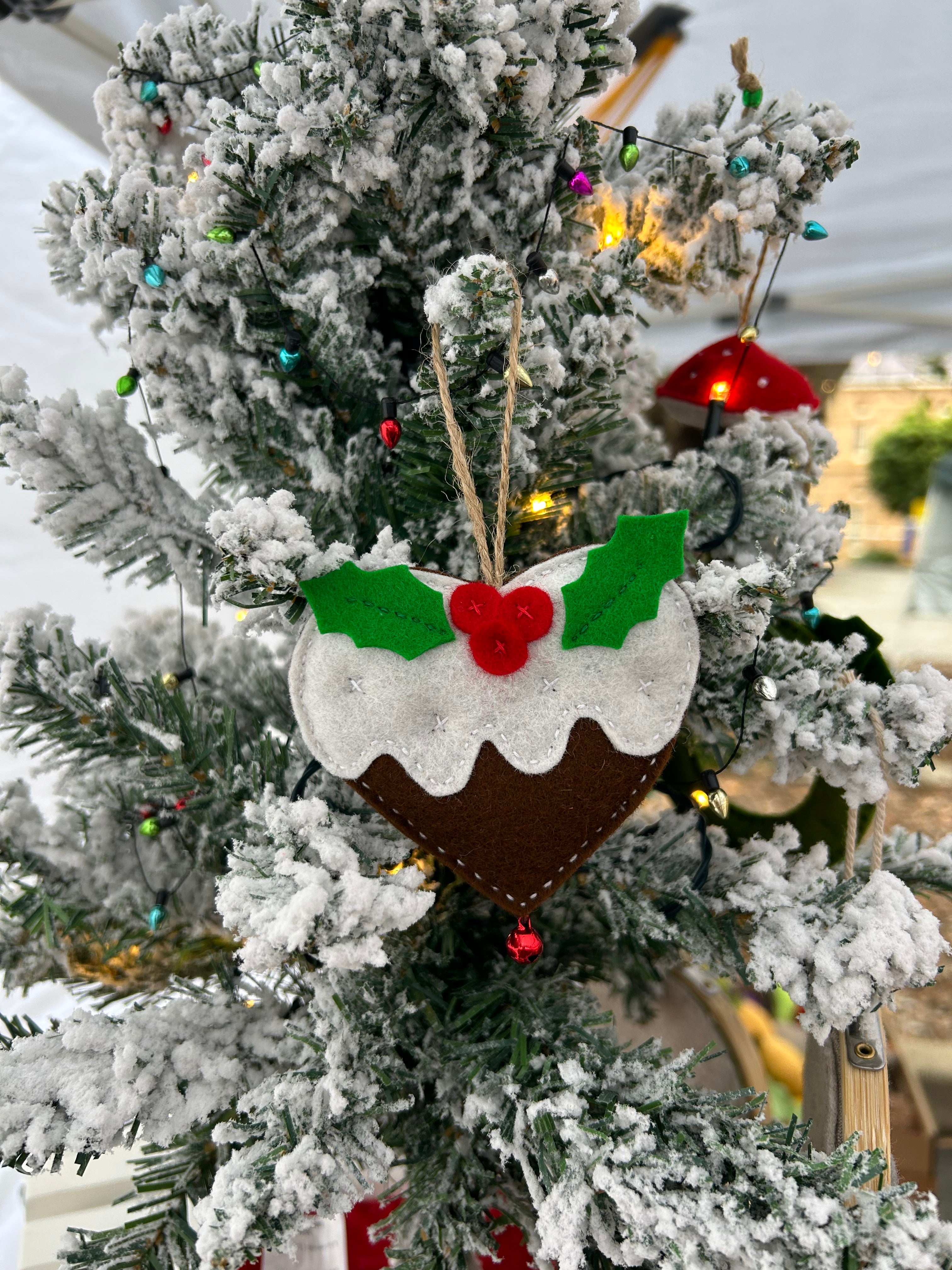 Christmas pudding heart decoration with a bell