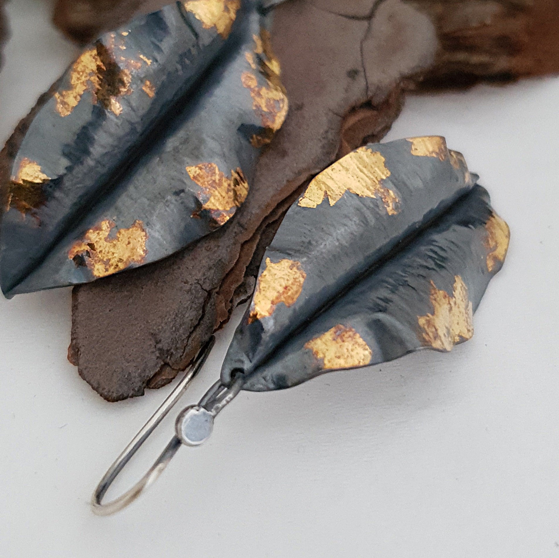 Gold & black leaves earrings