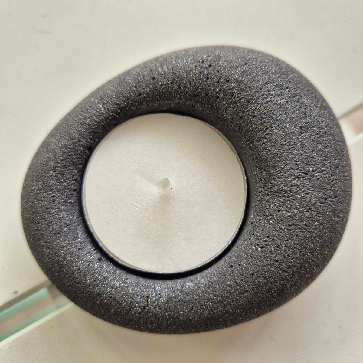 Black eco-stone pebble shaped tealight candle holder