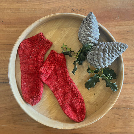 Christmas sparkle socks made with hand dyed yarn