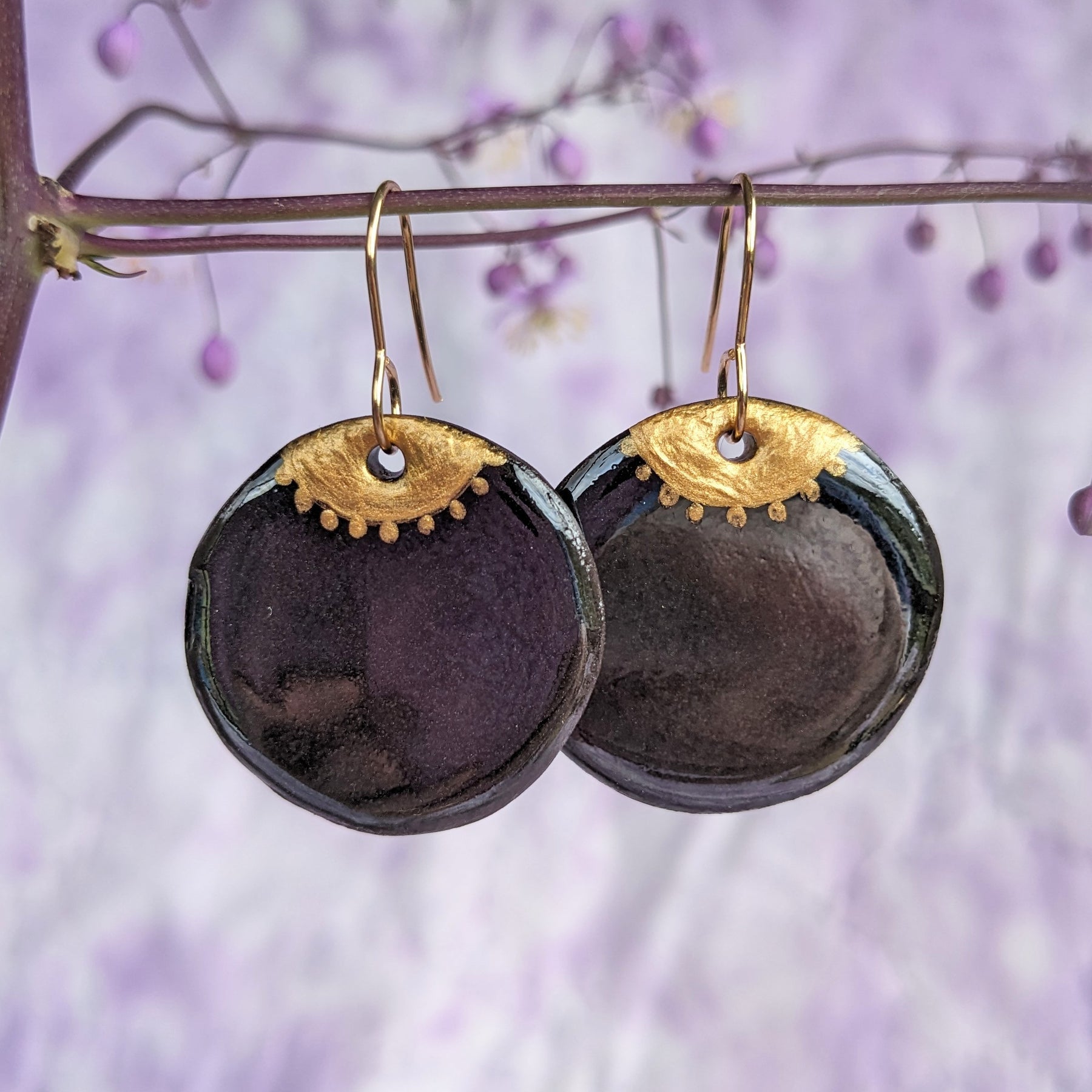 Golden Eye ceramic earrings. Lightweight, dangle earrings.