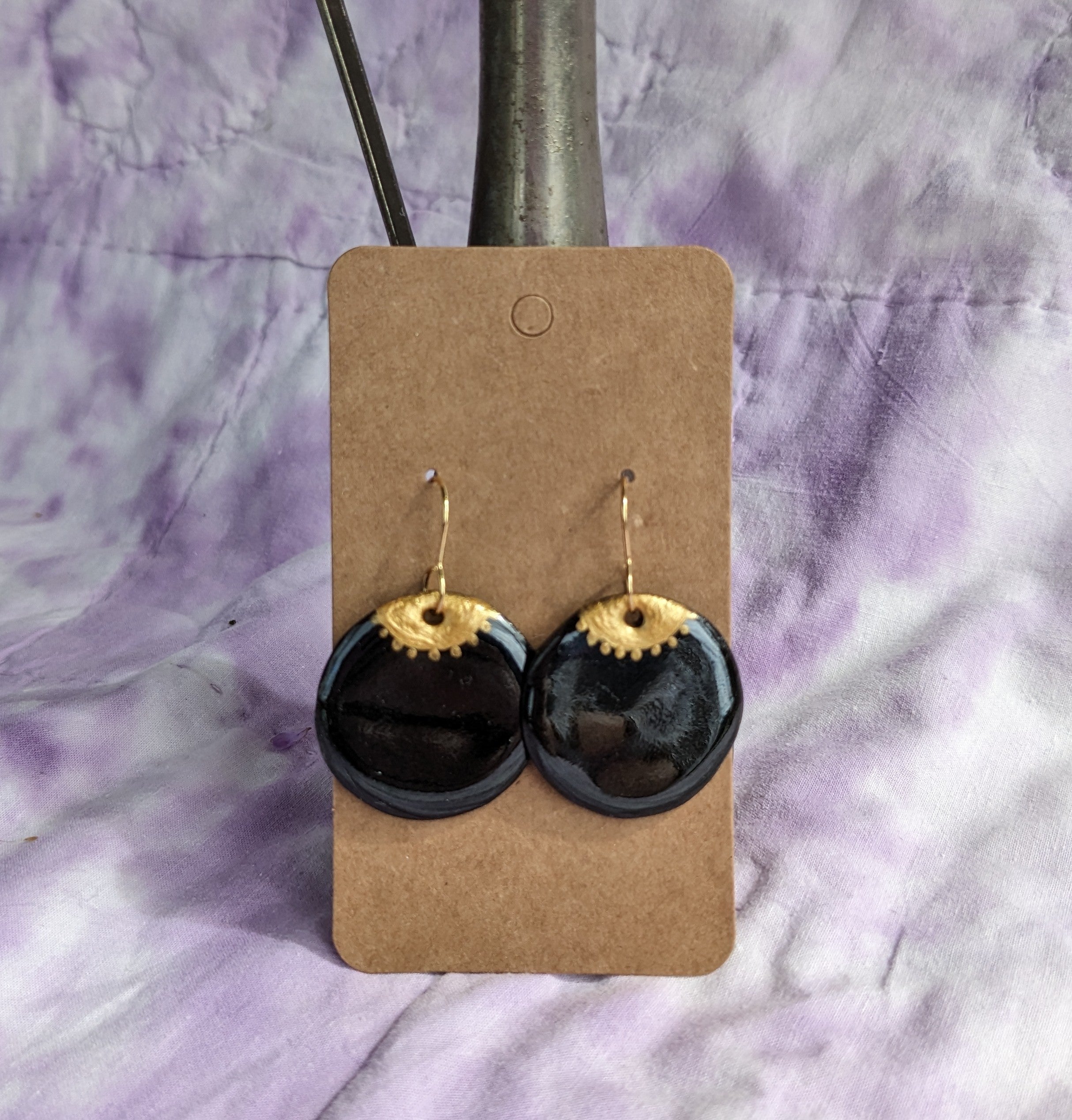 Golden Eye ceramic earrings. Lightweight, dangle earrings.