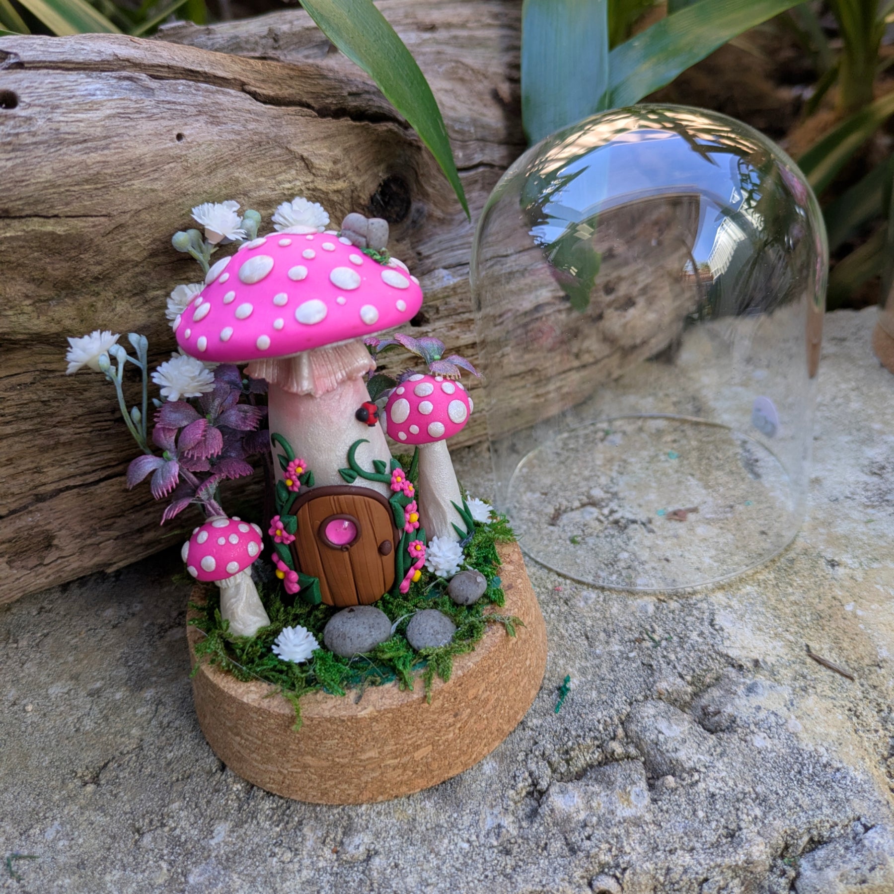 Pink Fairy Mushroom Houses in glass domes