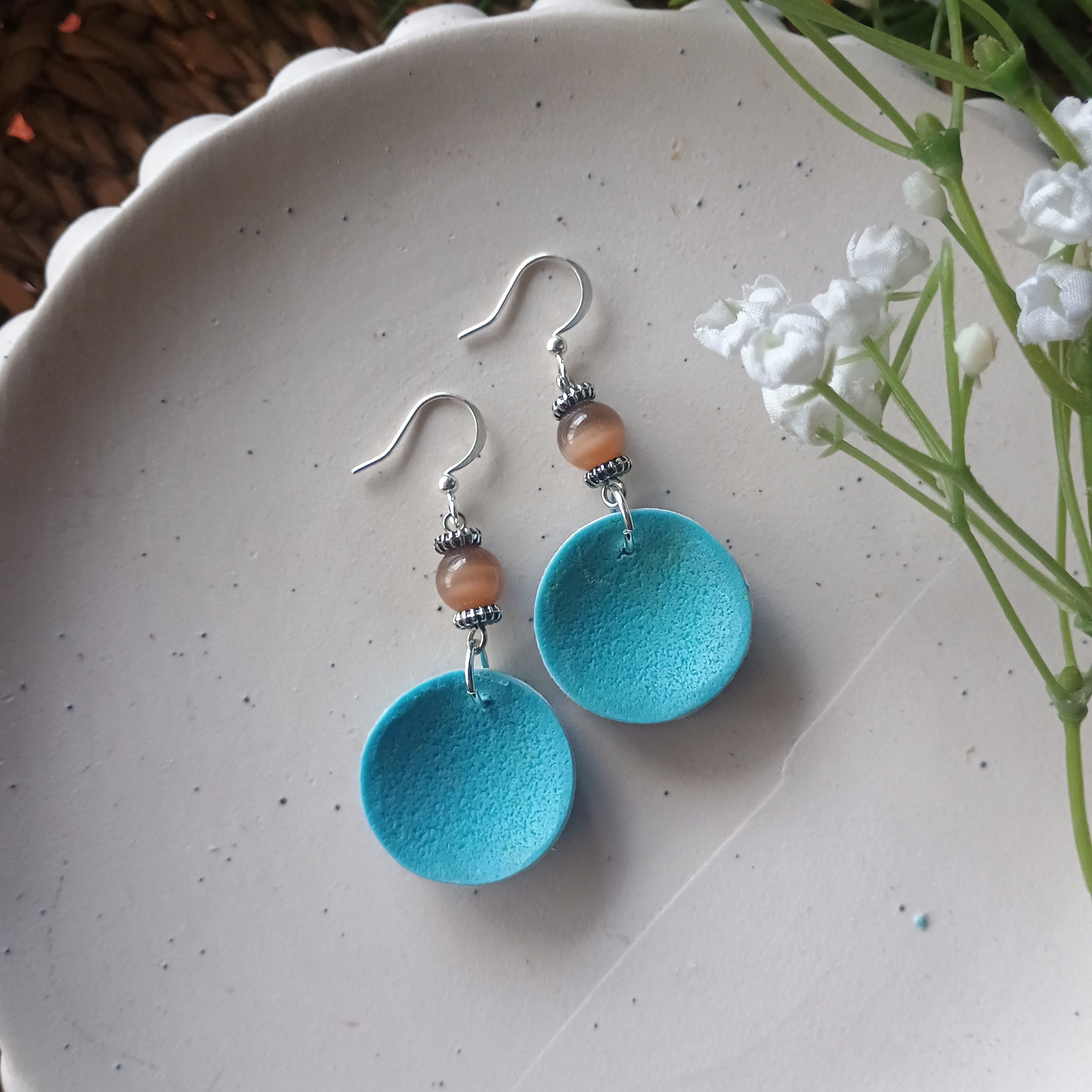 Domed blue marble print and bead polymer clay earring