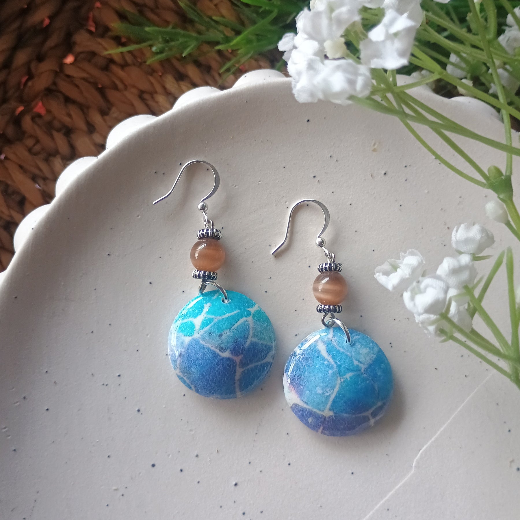 Domed blue marble print and bead polymer clay earring