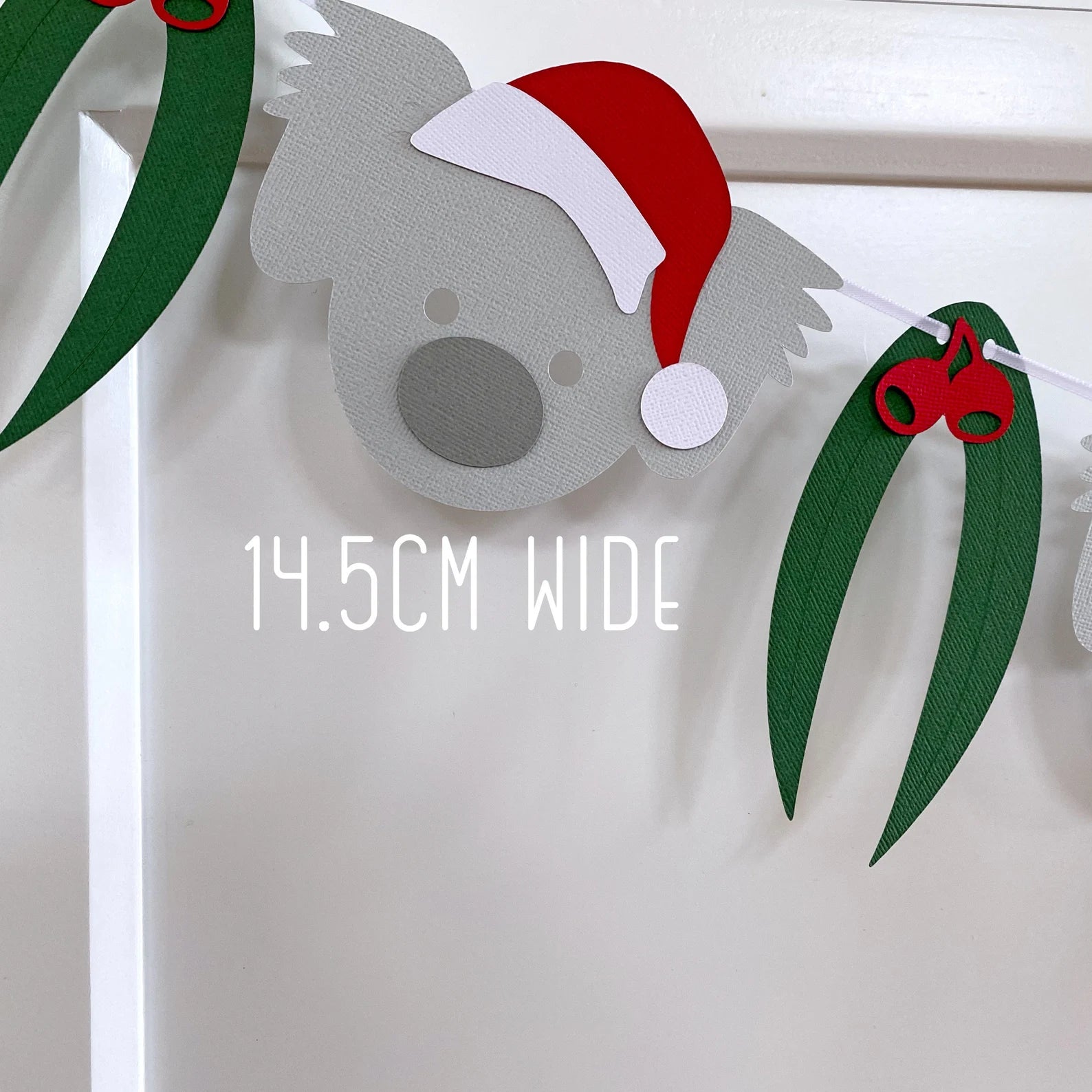 Christmas Koala Garland. Koala in Santa hat banner.