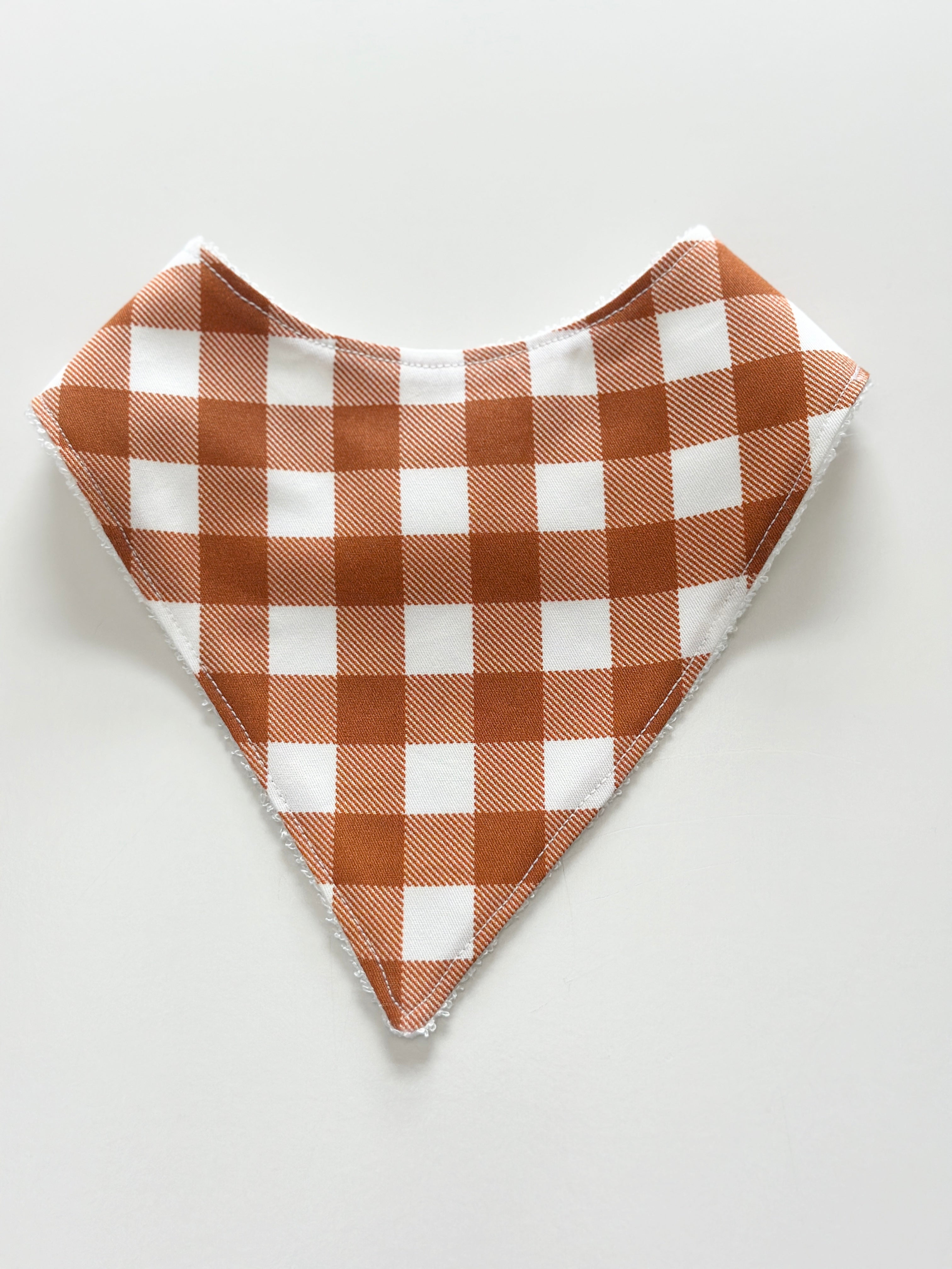 Rust gingham bandana bib
